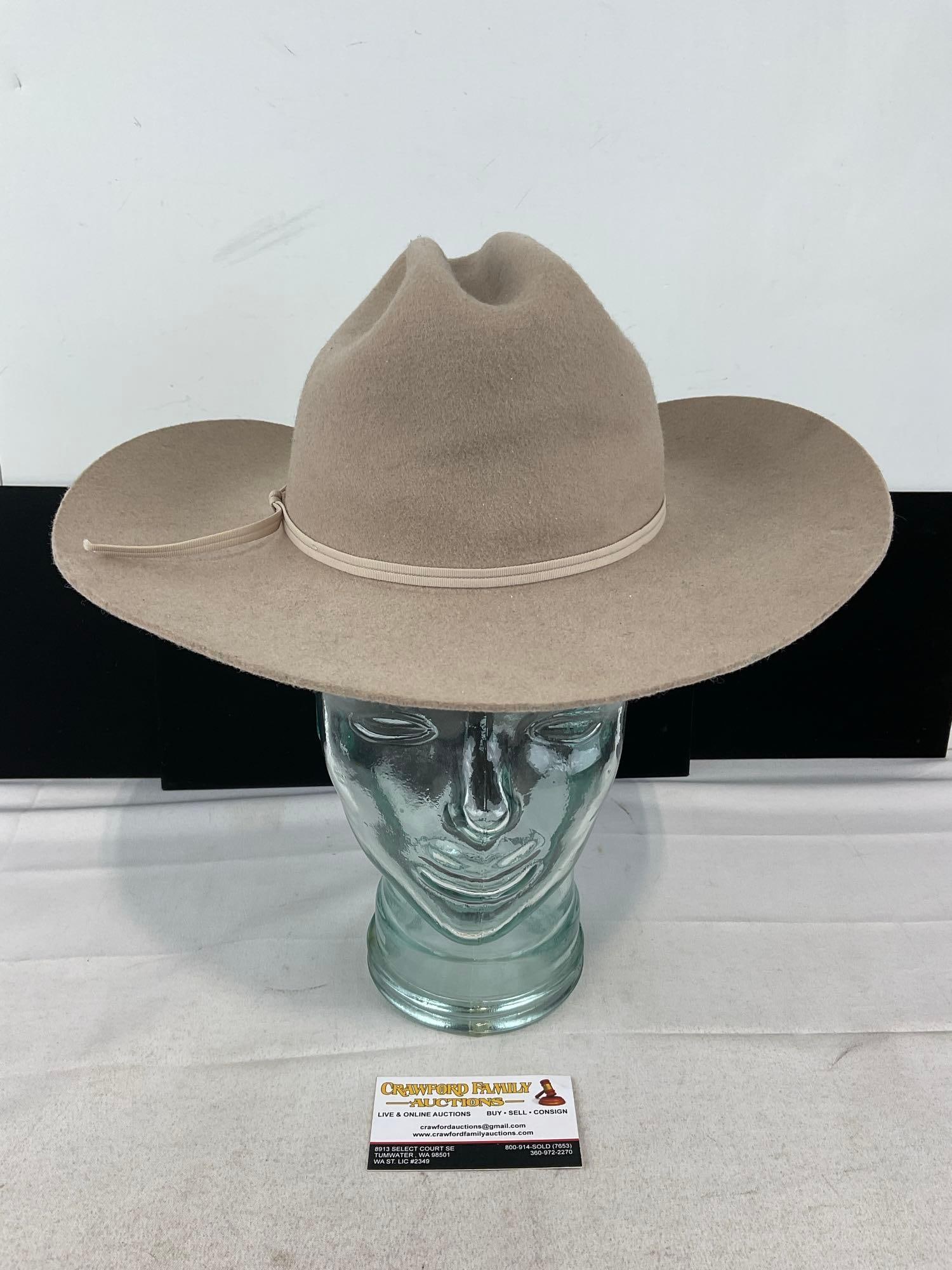 Rodeo King Tan Felt Cowboy Hat, Size Large: Looks like a former owner wrote their name inside. Looks to be in great shape. The piece measures approx 7h x 14w x 14d inches. See pics. E-6180
