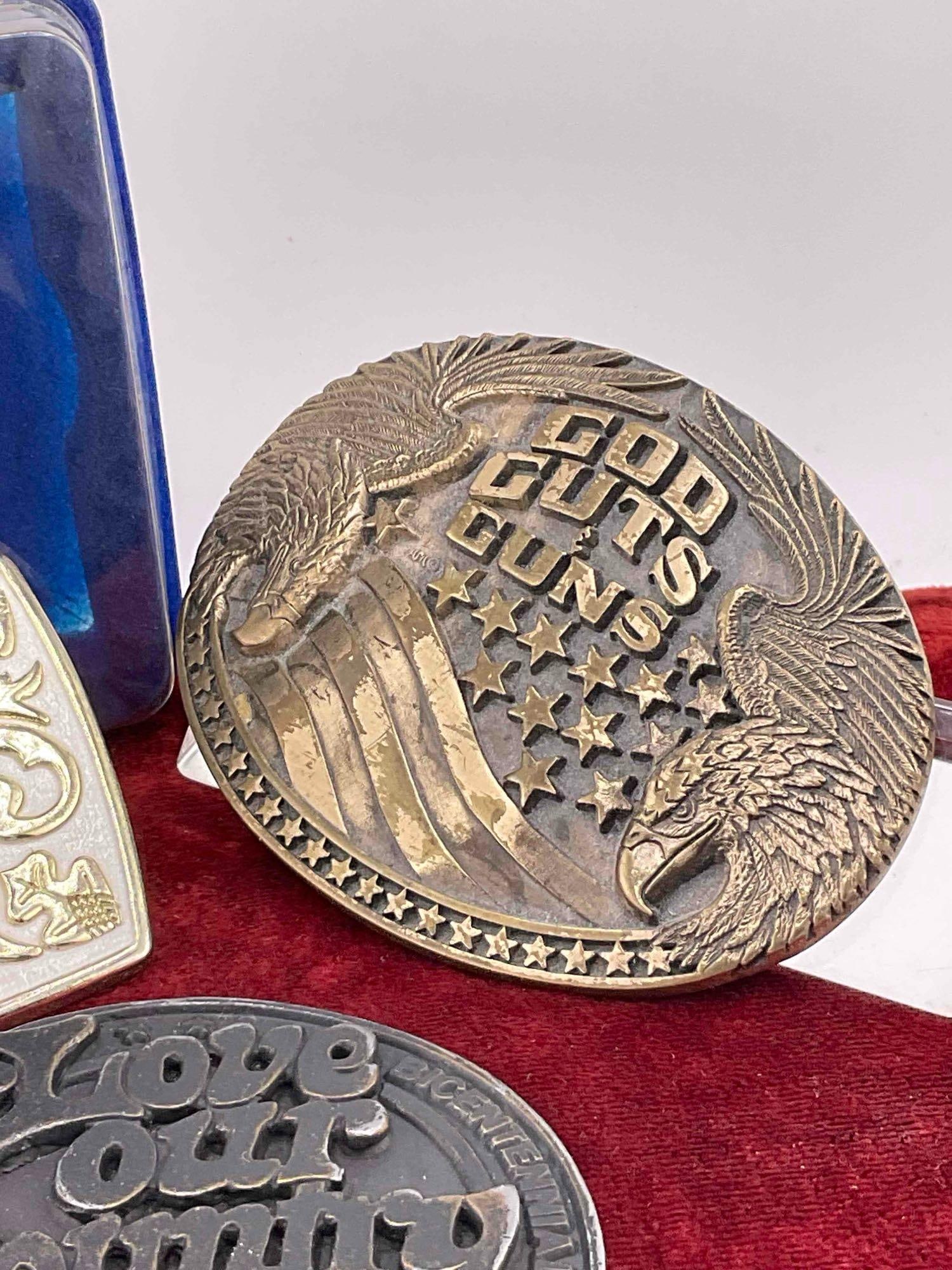 3 x buckles, lucky horseshoe, bicentennial KMPS radio, God, guts, & guns - 4