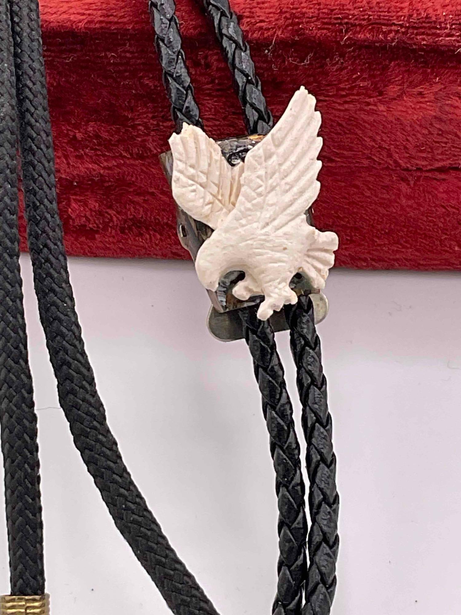 assortment of foreign coins, two eagle themed bolo ties, Eagle ring, two lighters - 5