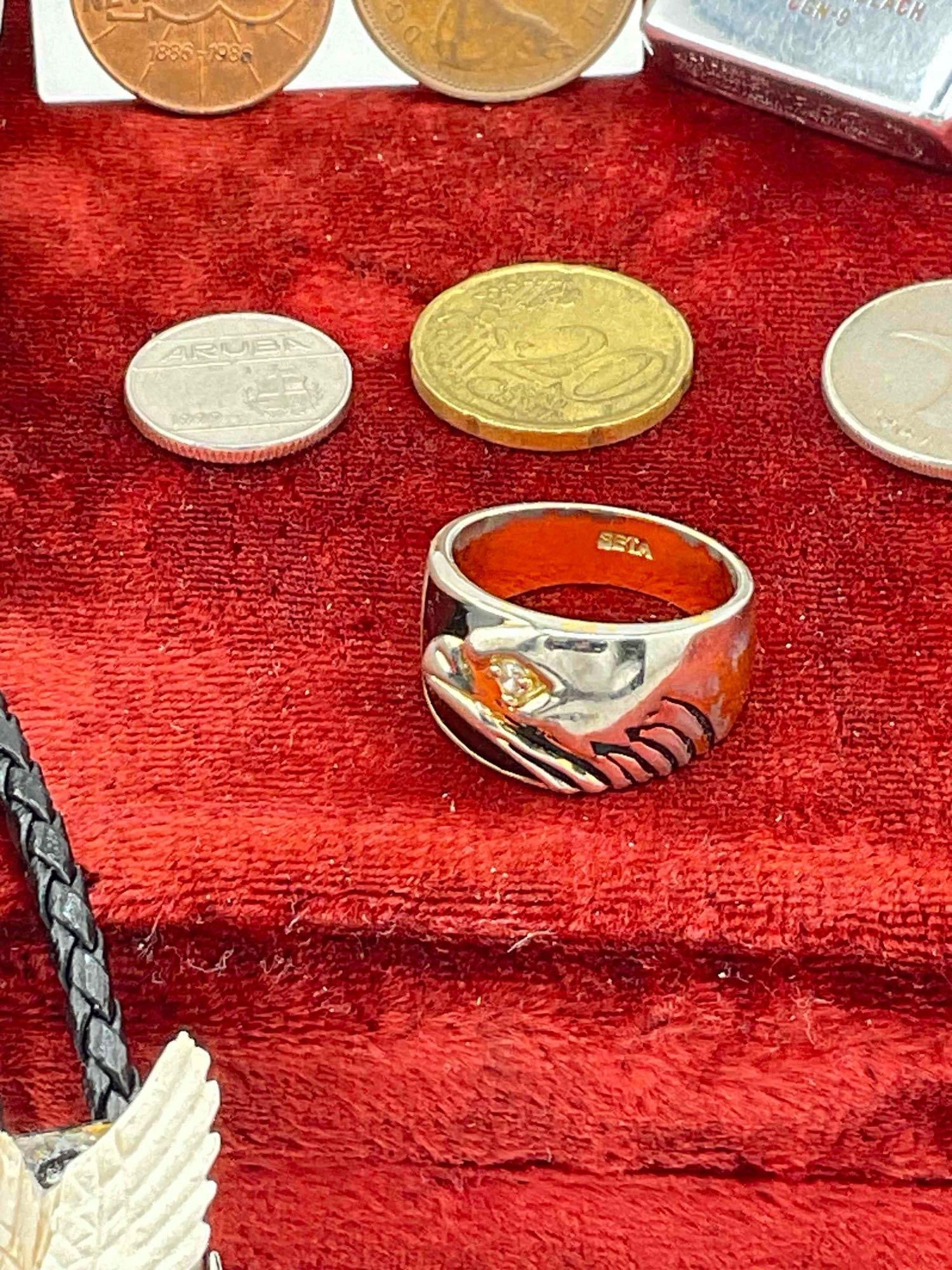assortment of foreign coins, two eagle themed bolo ties, Eagle ring, two lighters - 6