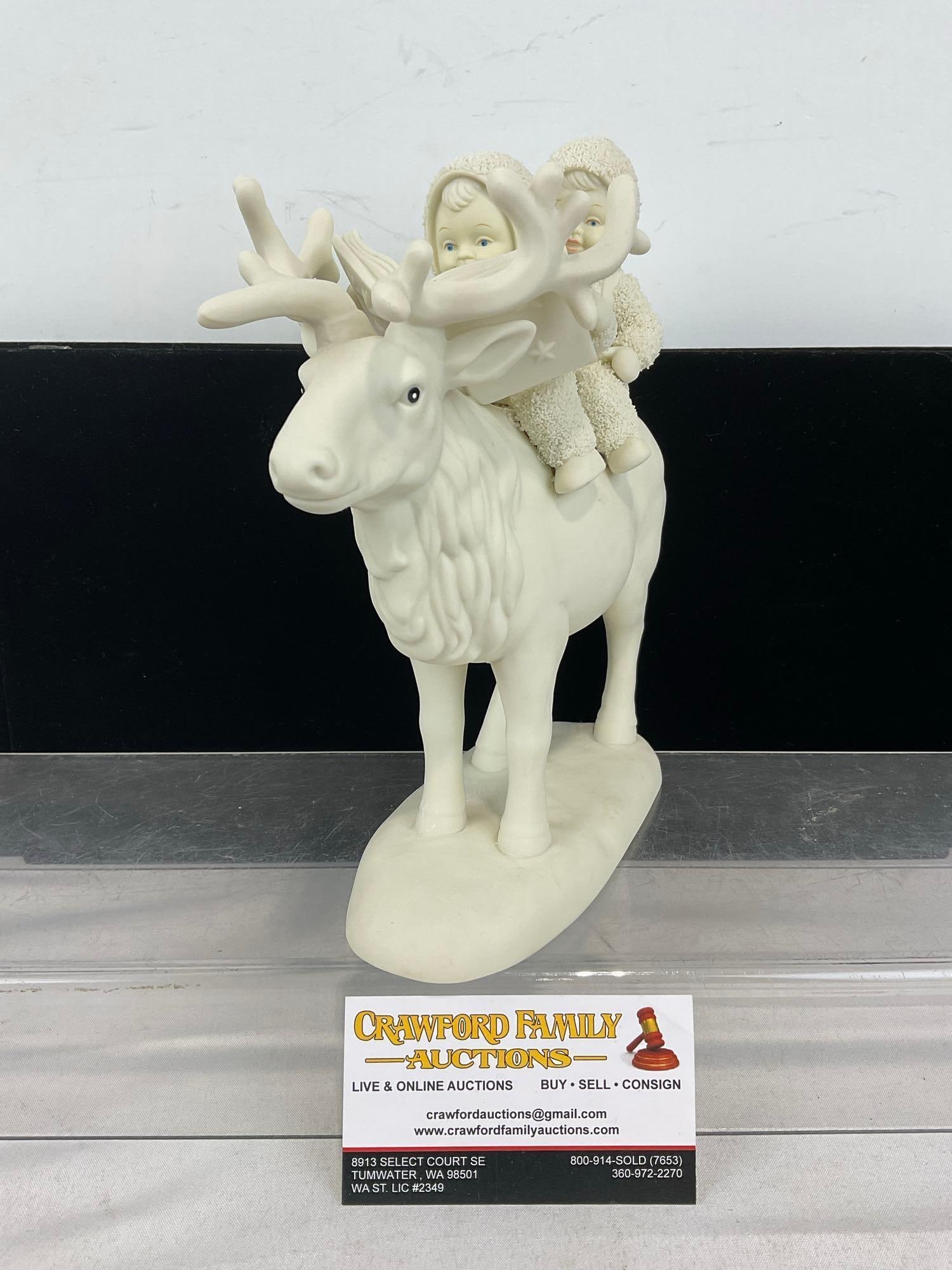 Dept. 56 Snowbabies Porcelain Figure titled A Journey For Two, By Caribou! 9h x 8w x 5d inches: Appears to be in good shape. The piece measures approx 9h x 8w x 5d inches. See pics. E-6160