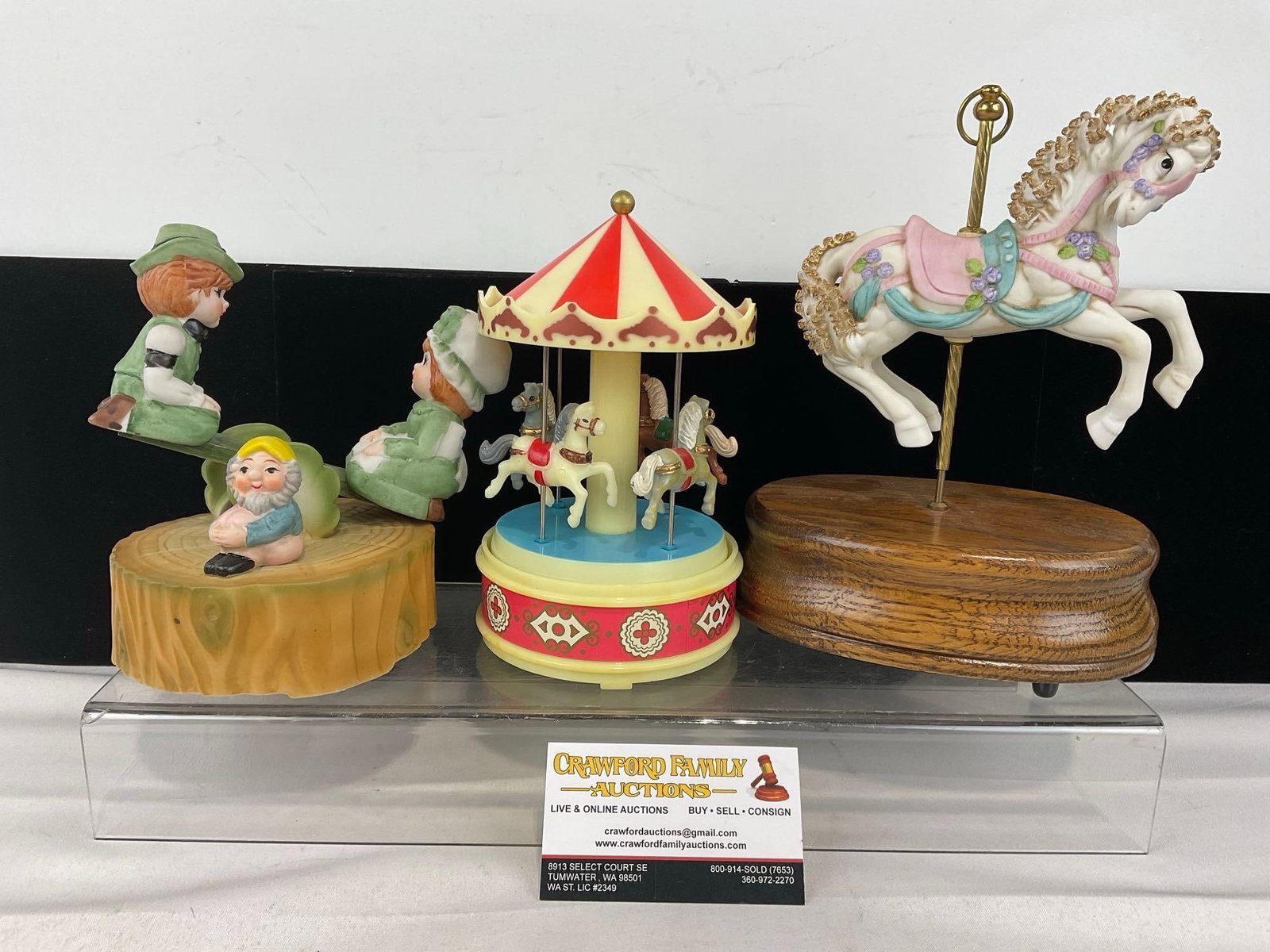 3 Music Boxes, Plastic Carousel, 2x Porcelain, Bradley Import Carousel Horse & Lego Taiwan Seesaw: Appears to be in good shape. The pieces fit in a box that measures approx 9h x 13w x 13d inches. See pics. E-6160