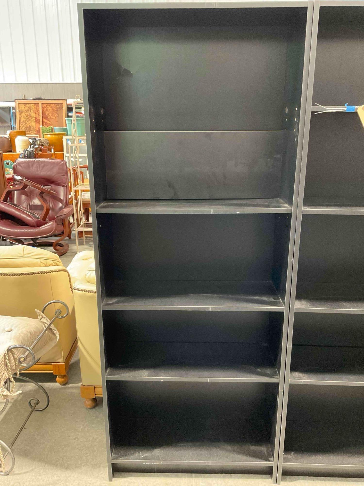Black Pressboard 4-Shelf Book Case. Measures 27" x 10" x 69" As Is Condition. See pics. (1 of 5)