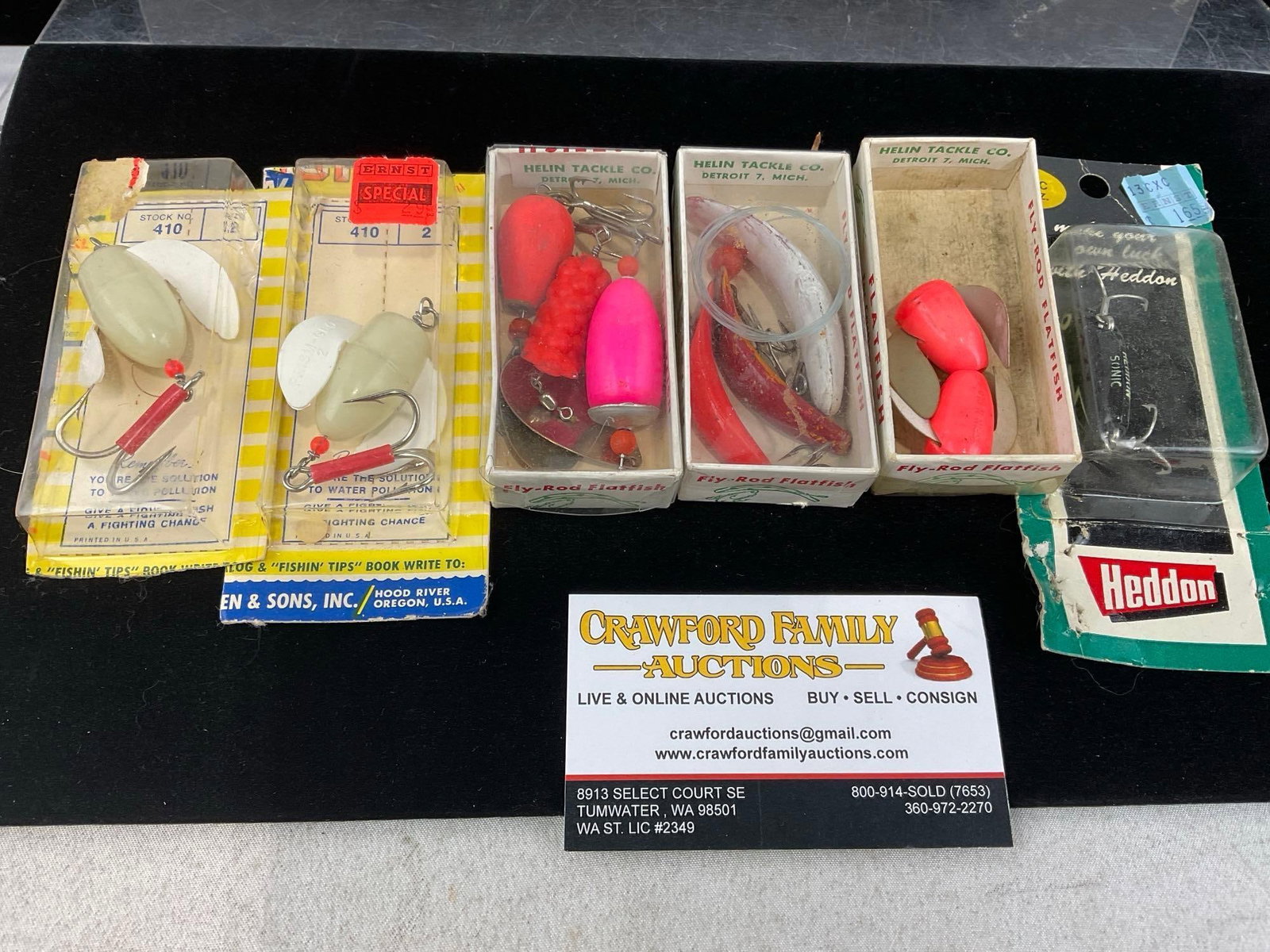 Assortment of Vintage Fishing Lures, 2 Tango Midget, Apple Nock-Er, Vibrax Spinner, & more: Not all pieces are from the brand of the box they are in. Appears to be in fair to good shape. The piece measures approx 6h x 6w x 4d inches. See pics. E-6160