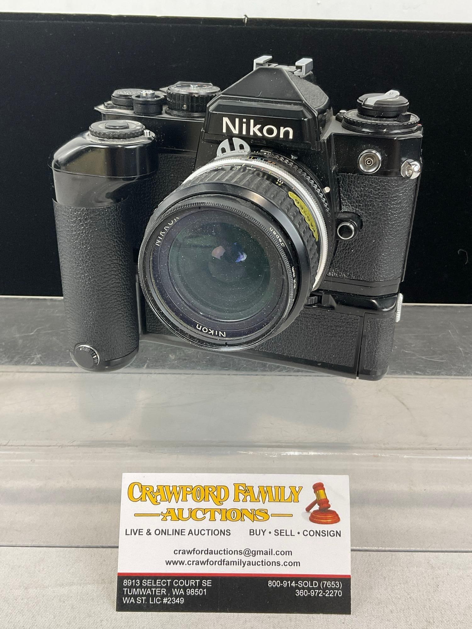 Late 70s-early 80s Manual Focus Nikon FE Film Camera, w/MD12 motor Drive, & Nikkor 28mm 1-3.5 Lens (1 of 7)
