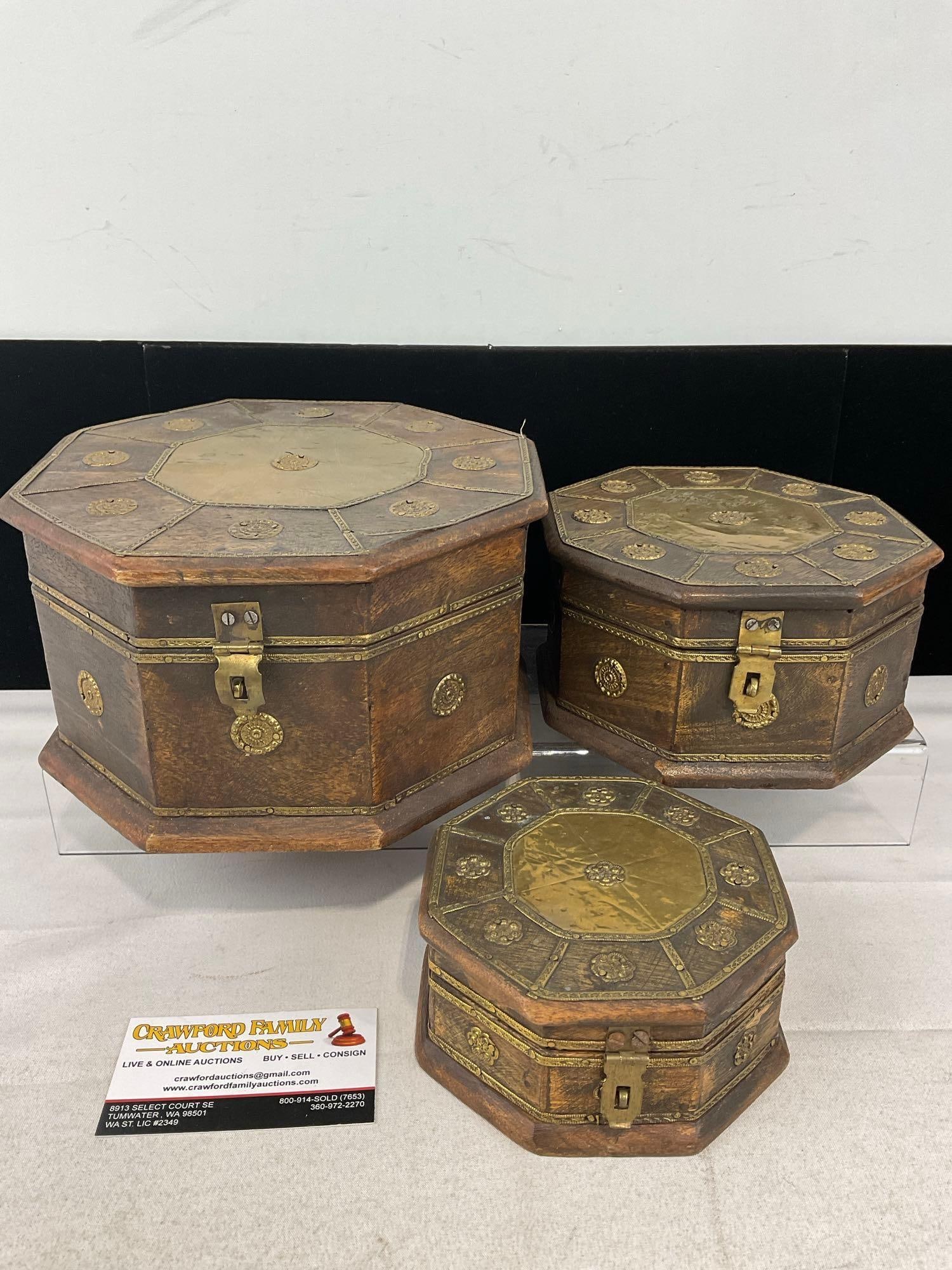 Set of Three Brass Ornamented Latching Octagonal Nesting Boxes, w/Medallion Accents: Appears to be in good shape. The piece measures approx 6h x 9w x 9d inches. See pics. E-6200