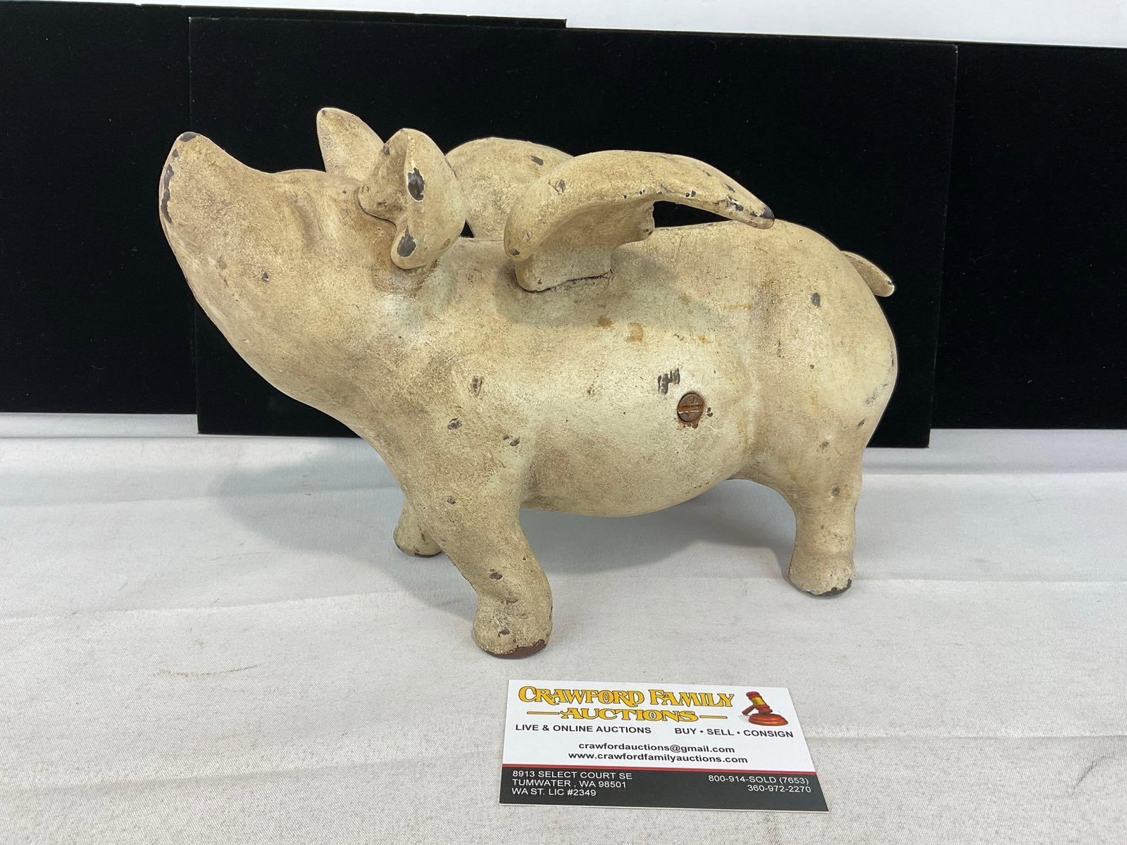 White Painted Cast Iron When Pigs Fly Piggy Bank, likely repro, 8h x 11w x 6d inches: Appears to be in good shape. The piece measures approx 8h x 11w x 6d inches. See pics. E-6240