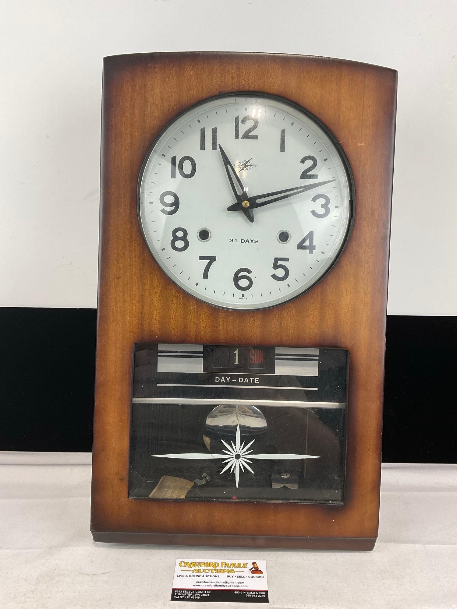 Vintage 1960s Rhythm Gloria 30-Day Wall Clock, 20x10x5 inches, made in Korea: Appears to be in good shape. The piece measures approx 20h x 10w x 5d inches. See pics. E-6240