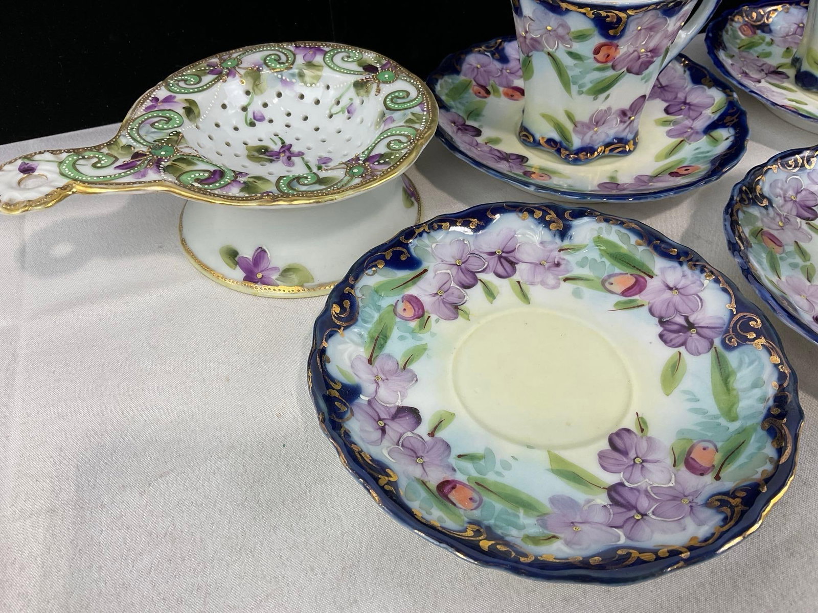 Vintage Teacup & Saucer Set, 4 cups, 5 saucers, & Teacup Strainer w/bowl, Unmarked, Cobalt & Floral - 2