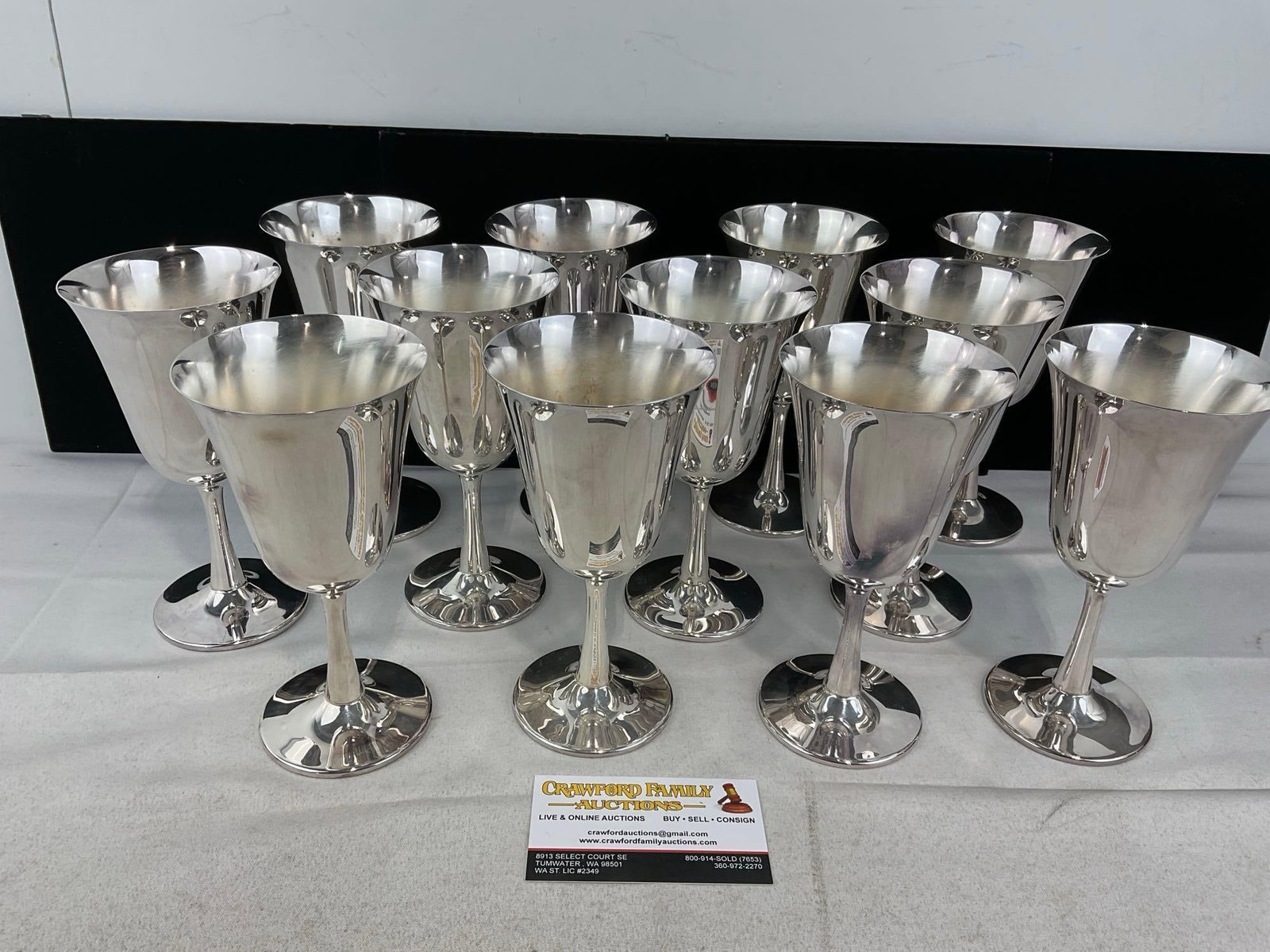 Set of 12 Silver Plated Crescent Silver MFG Goblets: Appears to be in good shape, 2 a bit uneven on the base. The piece measures approx 9w x 13w x 13d inches. See pics. E-6270