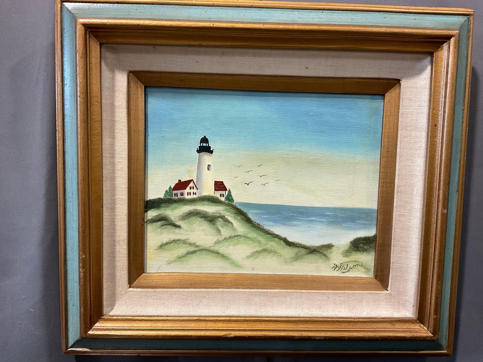 Framed Oil on Canvas, Signed V. Wilson, 15x17 inches, Lighthouse on a hill: Appears to be in good shape. The piece measures approx 15h x 17w x 4d inches. See pics. E-6410