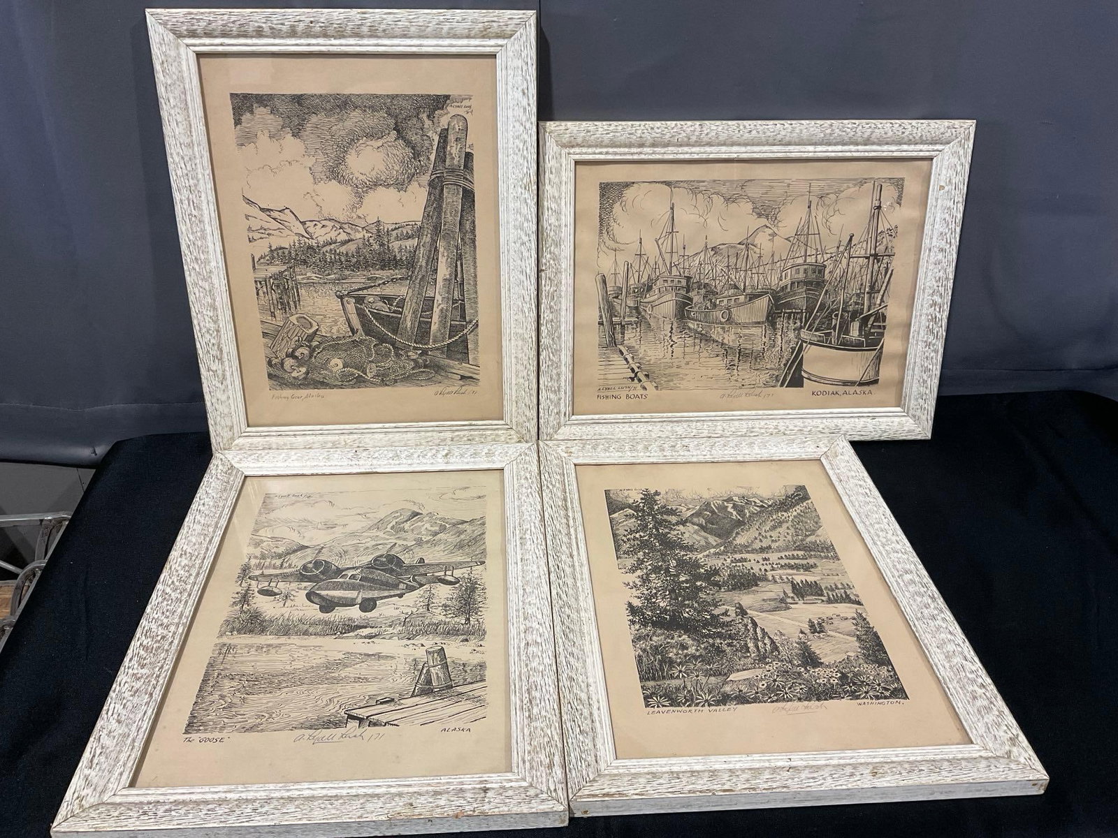 4x Framed Signed Lithos, Fishing Boats, The Goose, Leavenworth Valley by A. Lyall Lush, 19x15 in: & Fishing Gear, Alaska. Appears to be in good shape. The pieces together measures approx 19h x 15w x 4d inches. See pics. E-6410