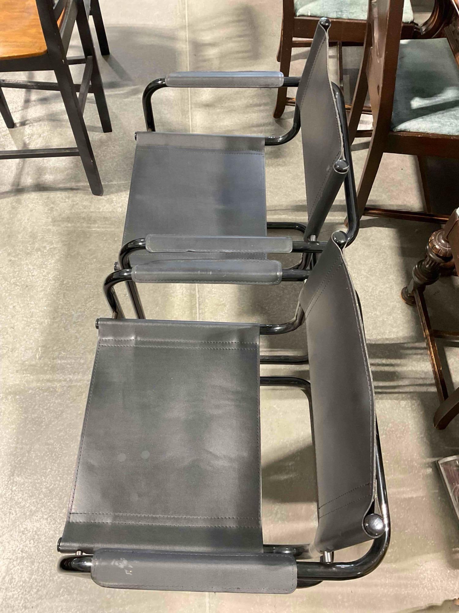 Pair of Black Metal & Faux Leather Cantilever Chairs. Fair Condition. Measures 24" x 21" x 32" - 2