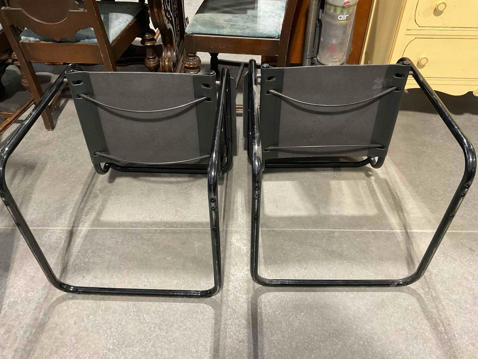 Pair of Black Metal & Faux Leather Cantilever Chairs. Fair Condition. Measures 24" x 21" x 32" - 4