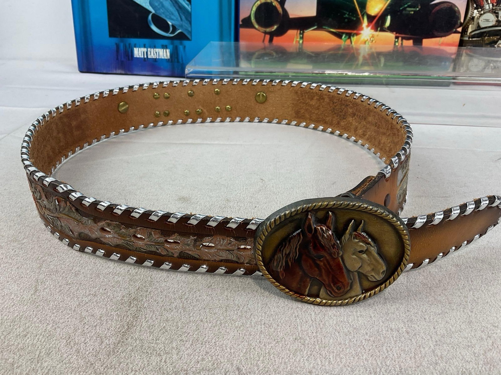 3x Books, Browning, Milestones of Aviation, Harley Davidson, & Ornate Belt & Buckle - 4