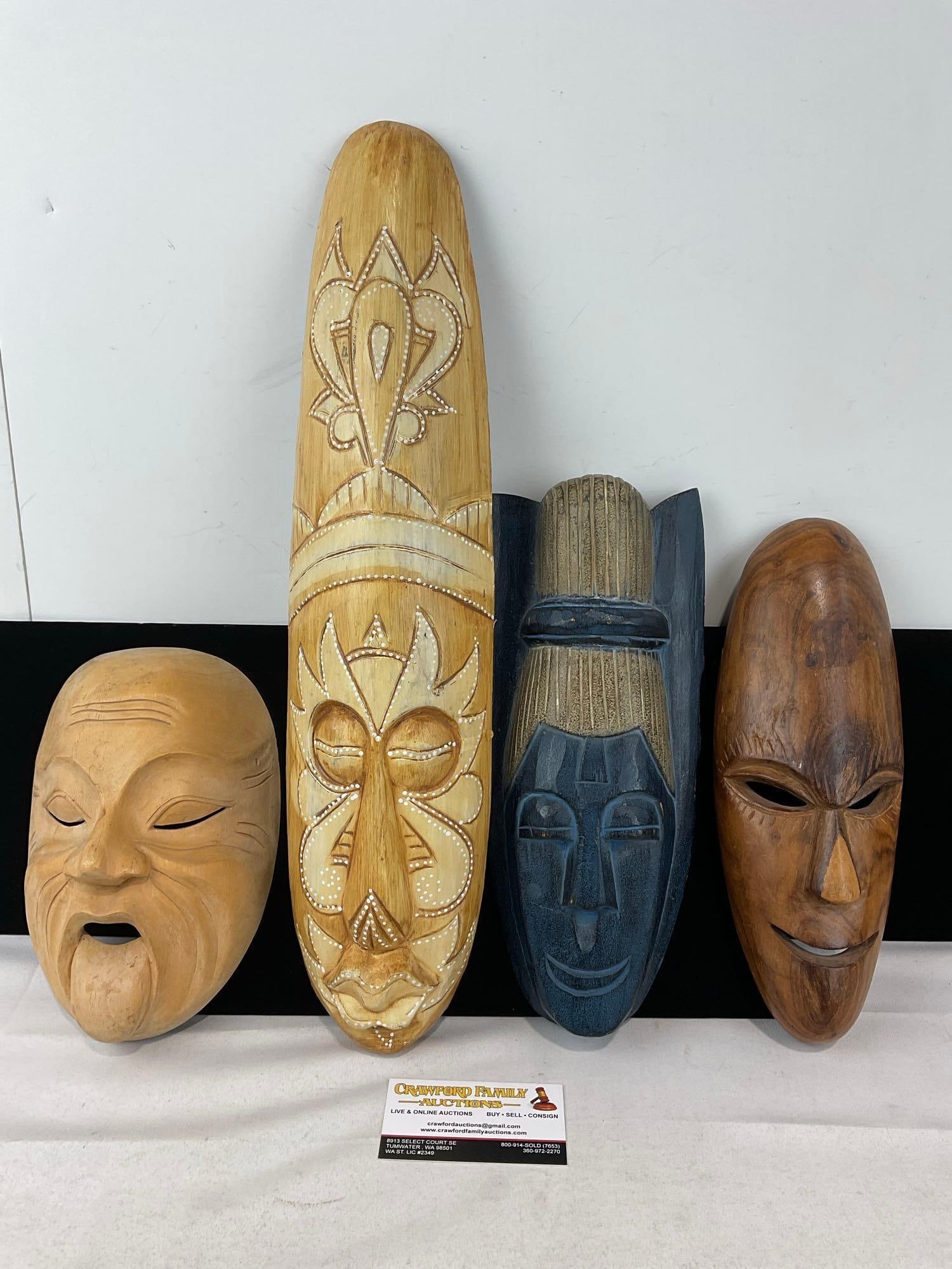 Set of 4 Masks, Japanese Okina, Shaman Indonesian w/longer face, & 2x African masks w/Dark Wood: Appears to be in good shape. The piece measures approx 21h x 10w x 5d inches. See pics. E-6230