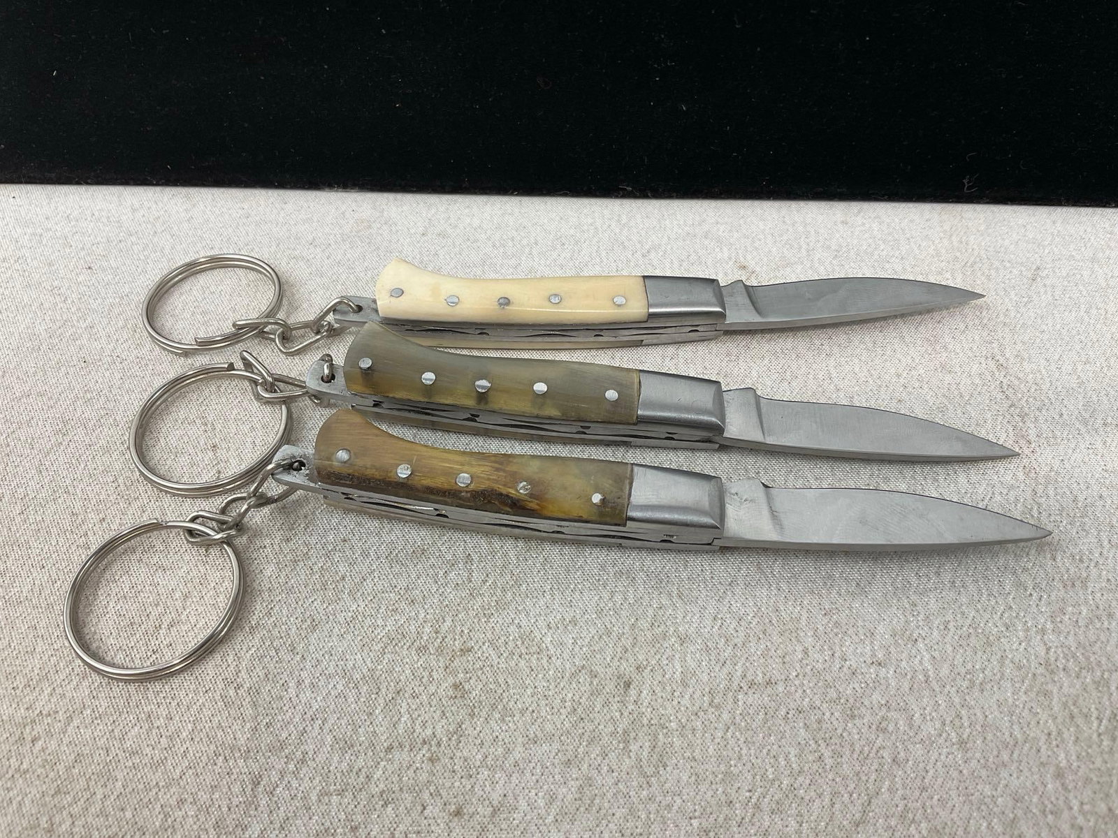 3 Small Keychain Folding Knives, White Resin Handle Scales - 2