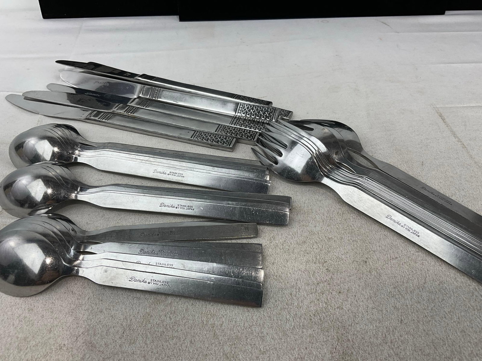 Danika Stainless Steel by MSI Japan, 8 salad forks, 7 butter knives, 7 soup spoons, 9 smaller spo... - 2