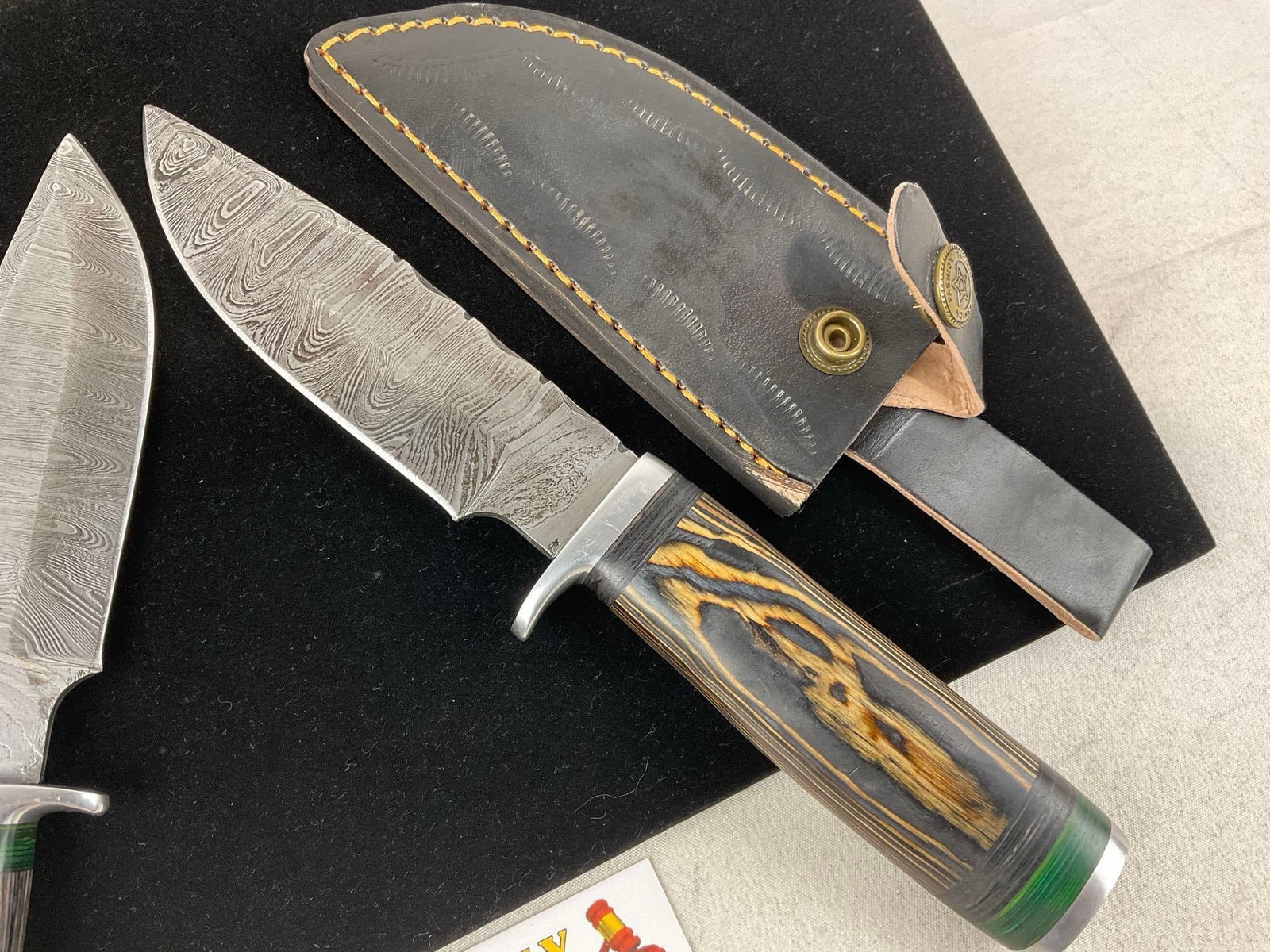 Pair of Knives w/ Damascus style Blades, Grey Tinted Wooden Handles & Leather Sheaths - 3