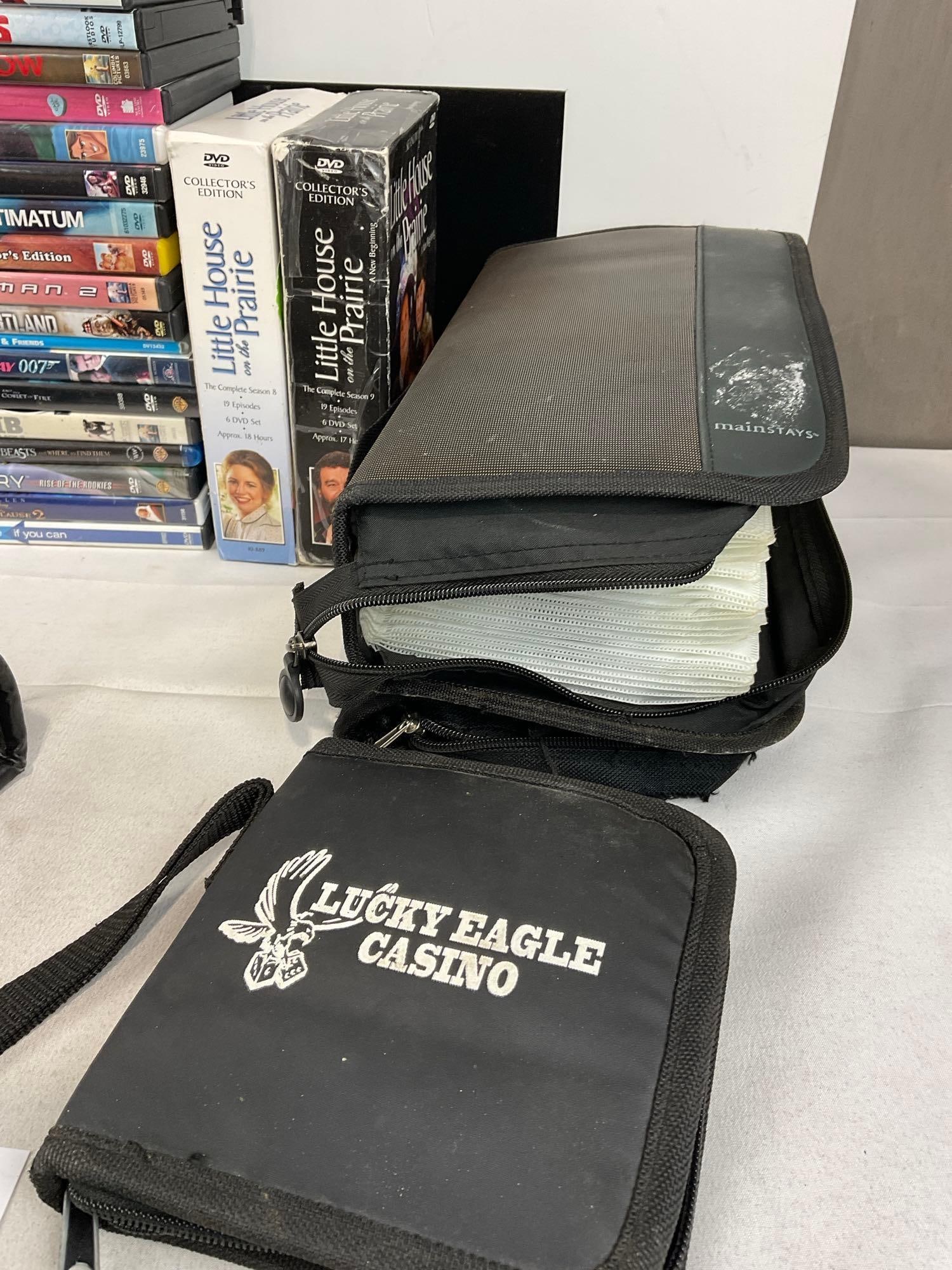 Collection of DVDs, 55+ w/cases, 100-200+ in the soft cases - 3