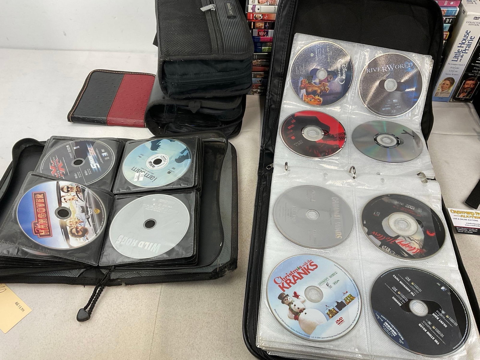 Collection of DVDs, 55+ w/cases, 100-200+ in the soft cases - 5