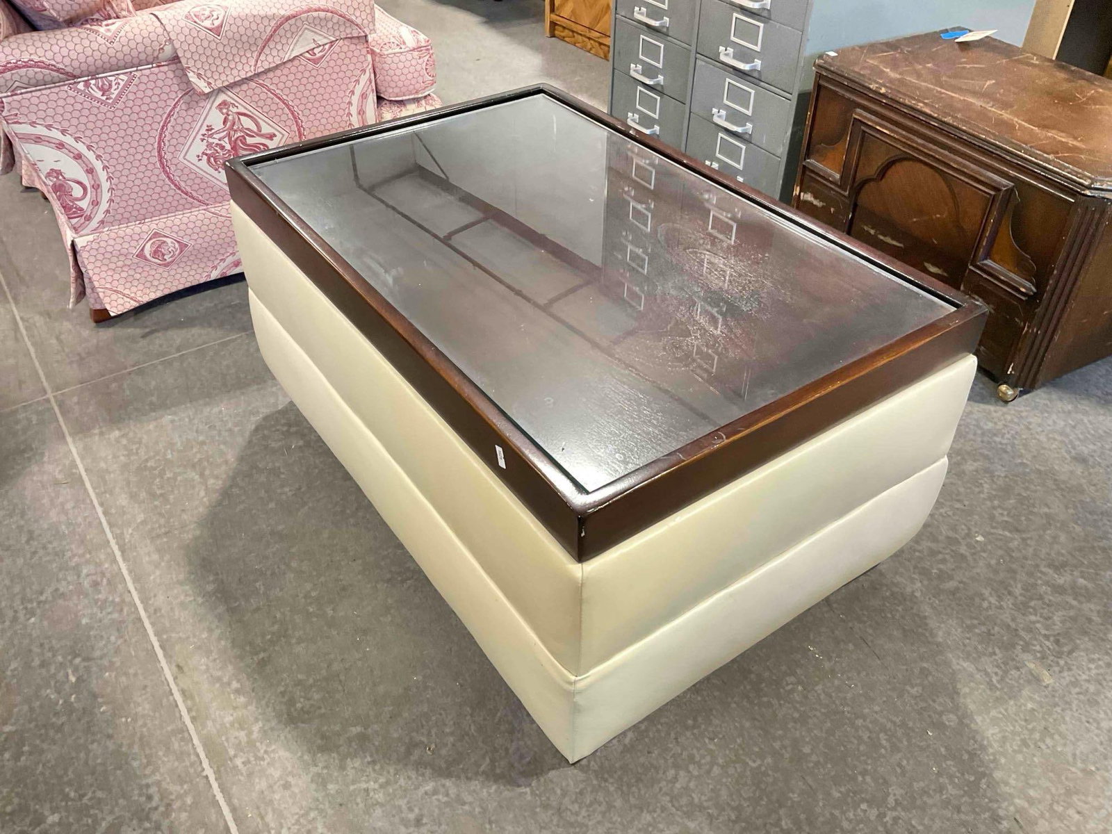 Modern Glass Topped Coffee Table w/ Wood & Cream Vinyl Base. Measures 35" x 23" x 17" See pics. - 2