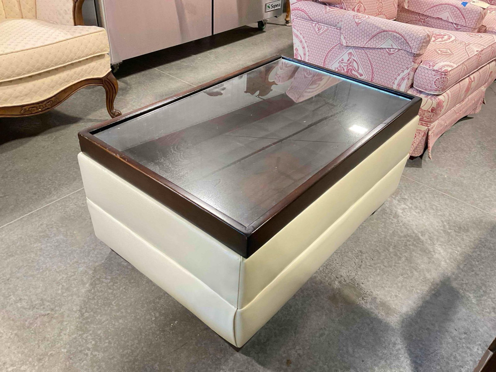 Modern Glass Topped Coffee Table w/ Wood & Cream Vinyl Base. Measures 35" x 23" x 17" See pics. - 3