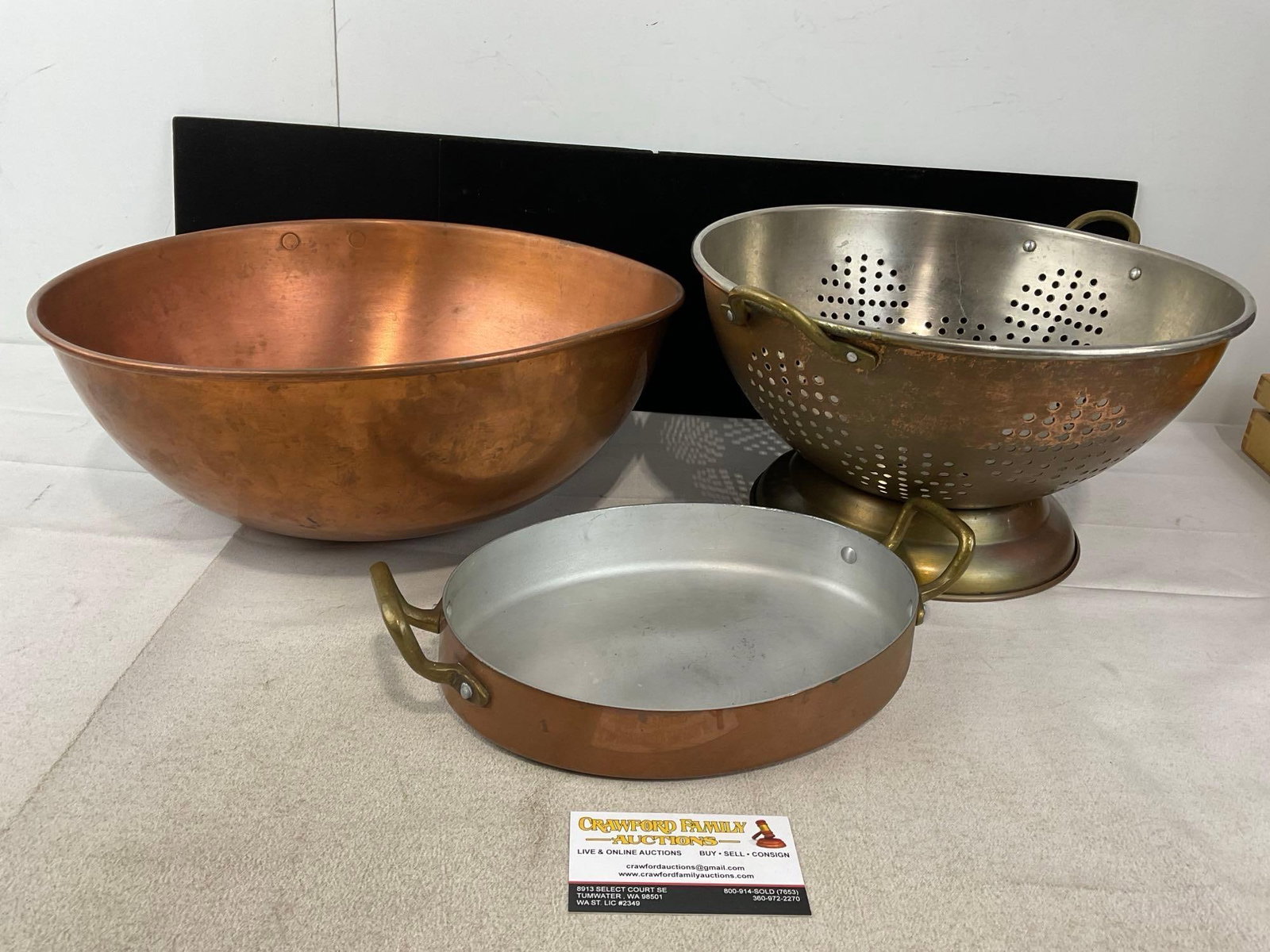 Vintage Large Copper Mixing Bowl, Large Colander, & Casserole Dish w/Brass Handles: Appears to be in good shape. The piece measures approx 9h x 15w x 15d inches. See pics. E-6230