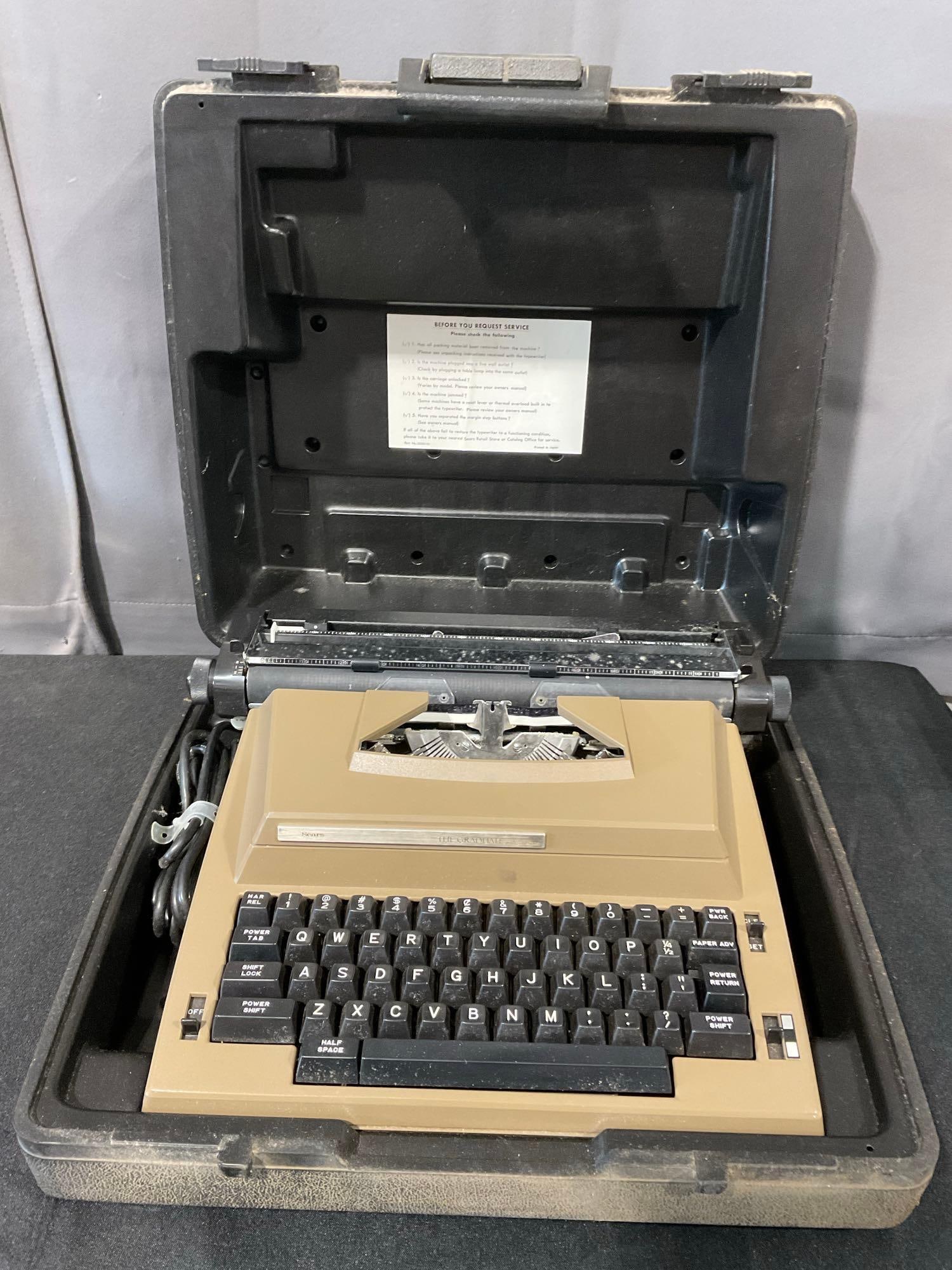 Vintage Portable Electric Typewriter, Sears Roebuck & co The Graduate model 161.53581 w/plastic c...: Appears to be in fair to good shape. The piece measures approx 17h x 17w x 8d inches. See pics. E-6300