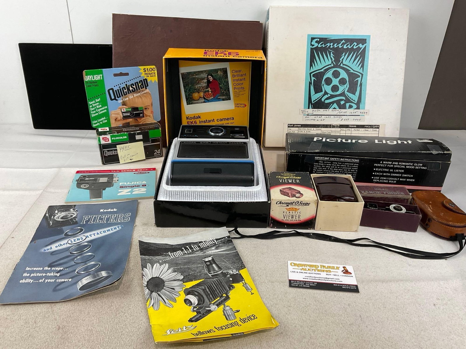 Kodak EK6 Instant Camera, Film Reels, Album of Vintage Vinyl, Photography Acces. Quicksnap Camera: Appears to be in good shape. The piece measures approx 9h x 13w x 13d inches. See pics. E-6510
