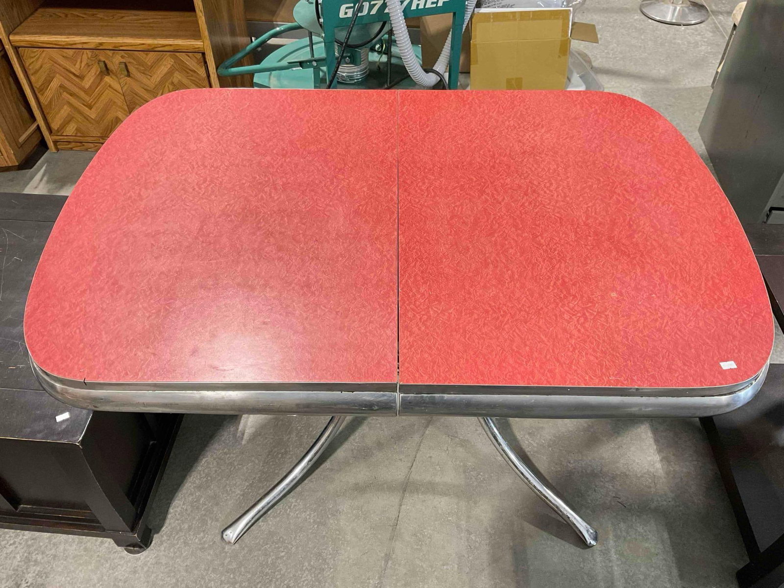Vintage Red Formica? Top & Chrome Diner Style Expanding Kitchen Table. As Is Condition.: Vintage Red Formica? Top & Chrome Diner Style Expanding Kitchen Table. As Is Condition. Table top is NOT bolted to base, floating loose, loose leaf cannot be installed. Piece has minor wear
