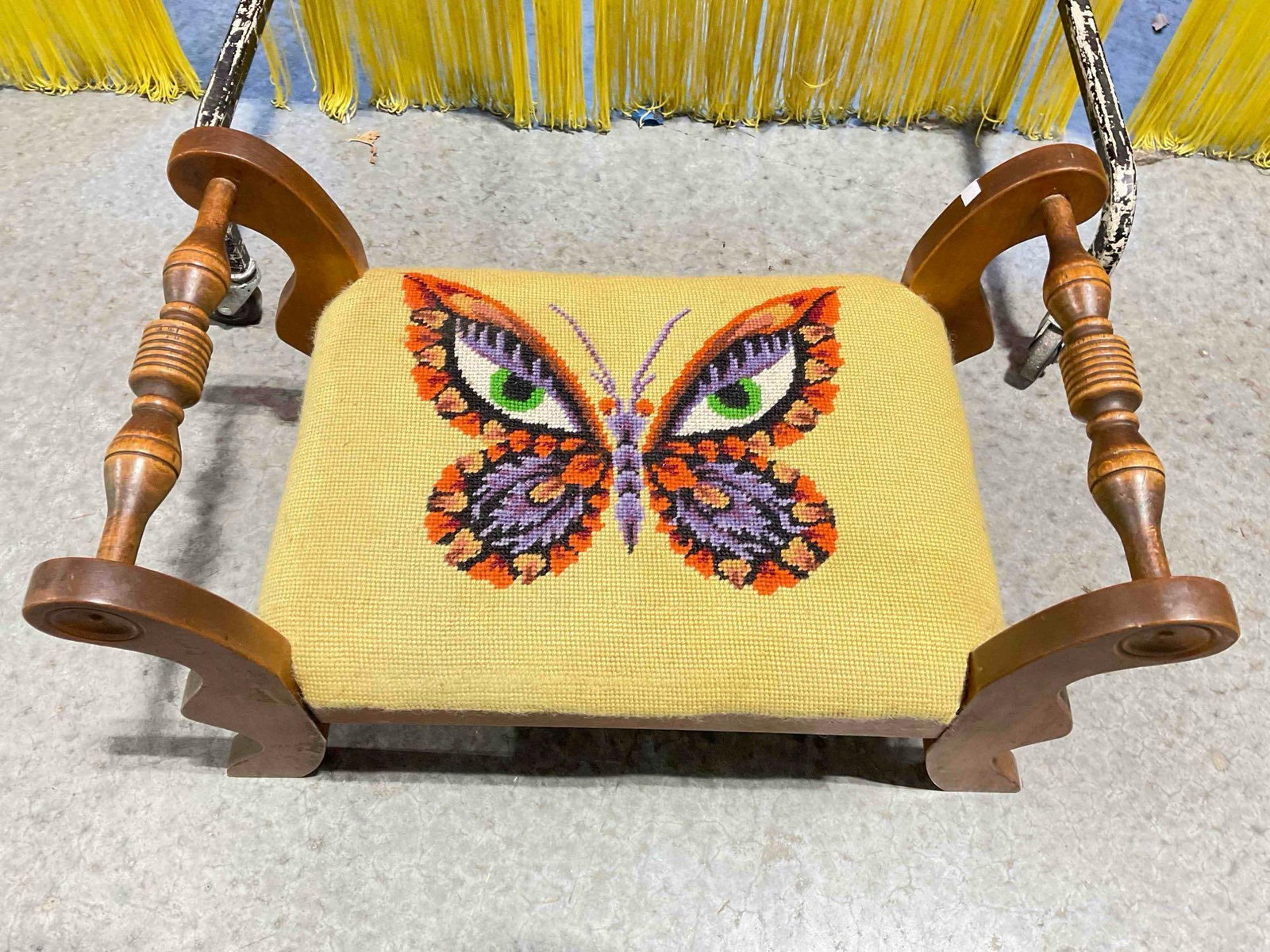 Vintage Wooden Footstool Ottoman w/ Surreal Butterfly Needlepointed Cushion. Good Condition.: Vintage Wooden Footstool Ottoman w/ Surreal Butterfly Needlepointed Cushion. Good Condition. Minor wear indicative of age and use, otherwise looks to be in good condition. Measures 20" x 10" x 16"