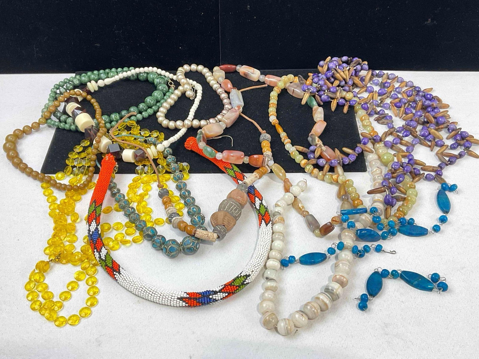 Large selection of assorted Beaded and stone Necklaces Incl Native american Hand beaded: c-5360