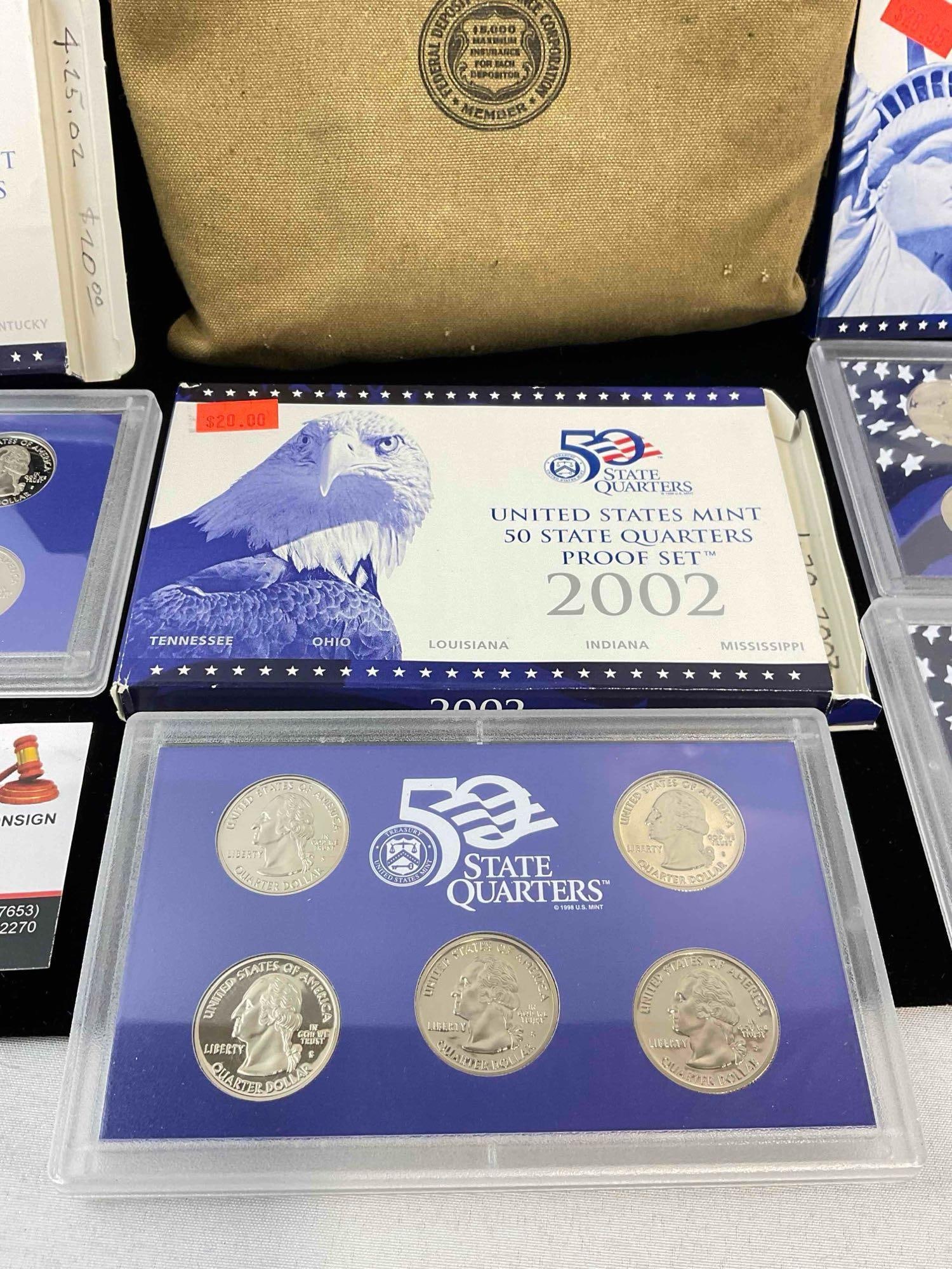 2001, 2002, & 2003 US mint State Quarter proof sets in vintage Seattle first national Bank Bag - 2