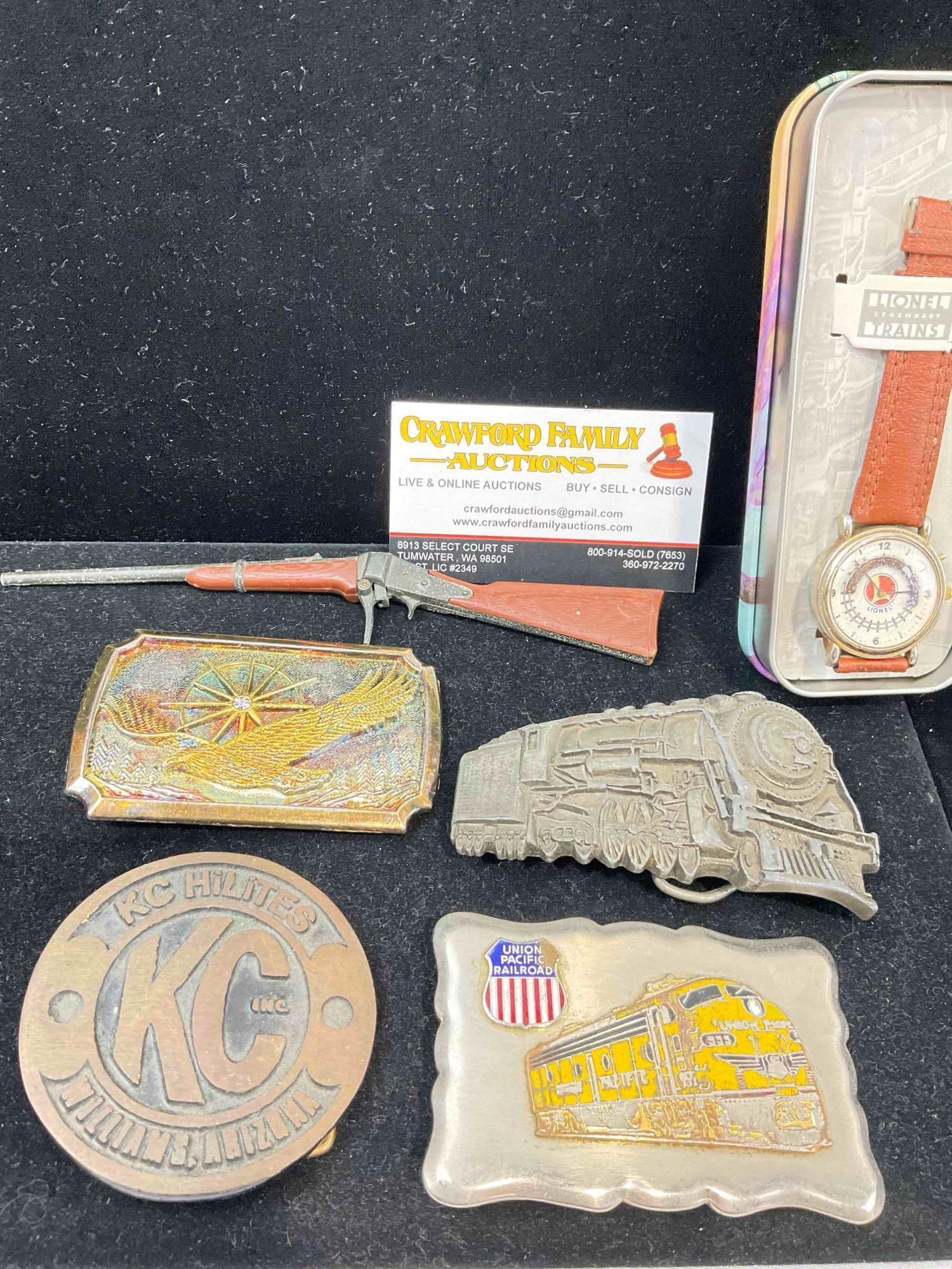 Lionel Train watch, 5x Belt Buckles, incl. Railroad, trucking & eagle themed & 2x Small Toys. - 3
