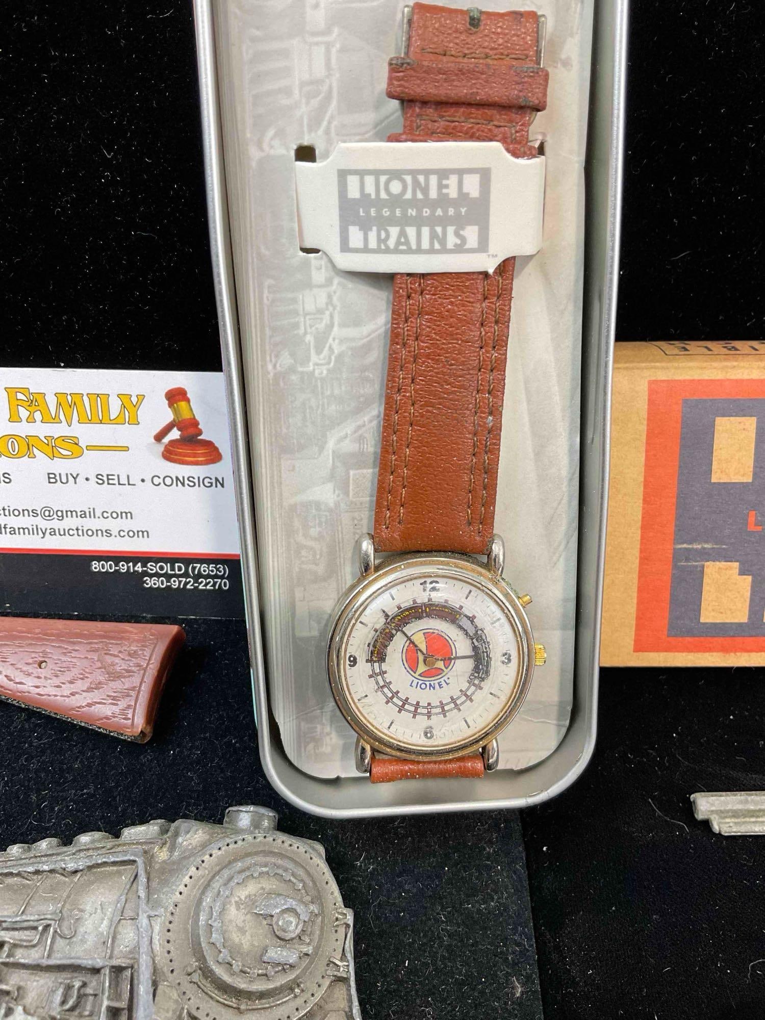 Lionel Train watch, 5x Belt Buckles, incl. Railroad, trucking & eagle themed & 2x Small Toys. - 5