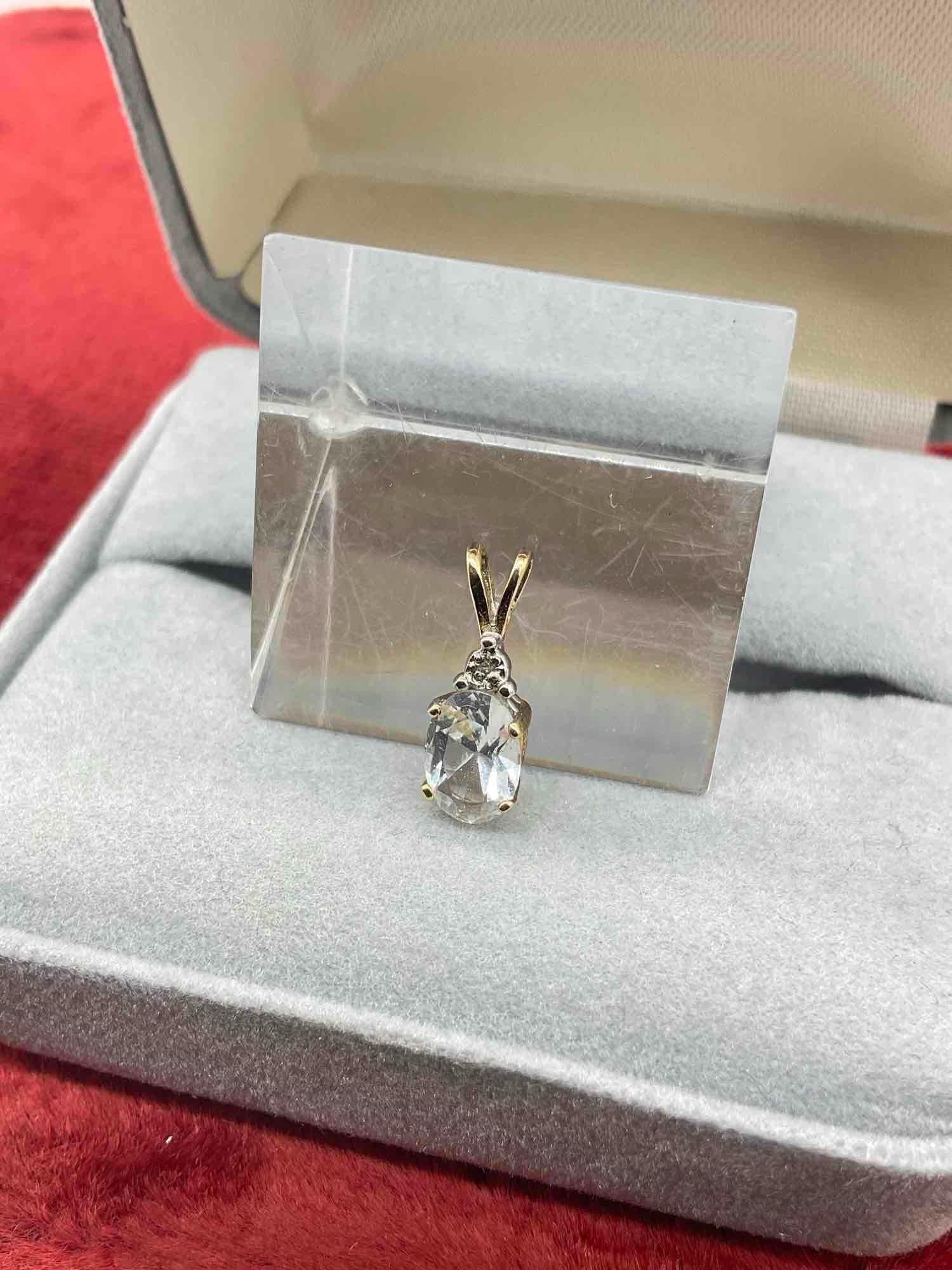 14k gold pendant featuring an approximate Brilliant oval cut Aquamarine - 2