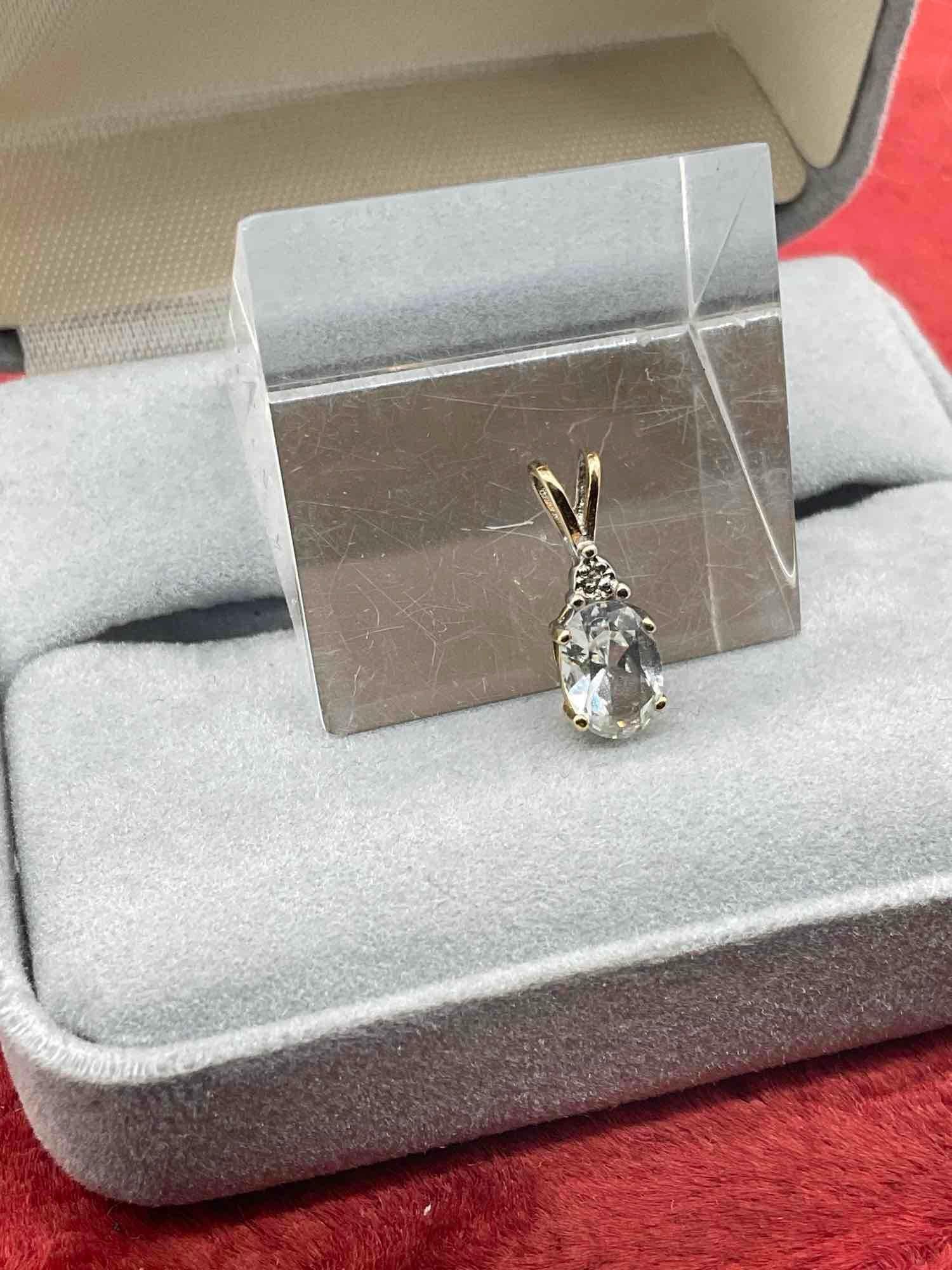 14k gold pendant featuring an approximate Brilliant oval cut Aquamarine - 3
