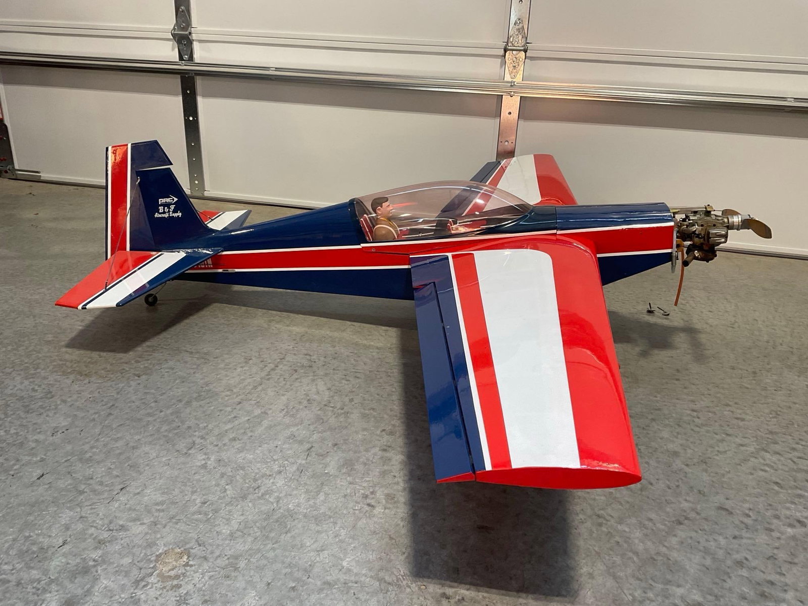 Vintage Extra Flugzeugbau EA300 Model Airplane, w/OS FS-120 Surpass 4 Stroke Glow Engine, 20cc: The plane models included engines that were working 1+ years ago. All from the same collection. Appears to be in good shape. The piece measures approx 64h x 32w x 18d inches. See pics.
