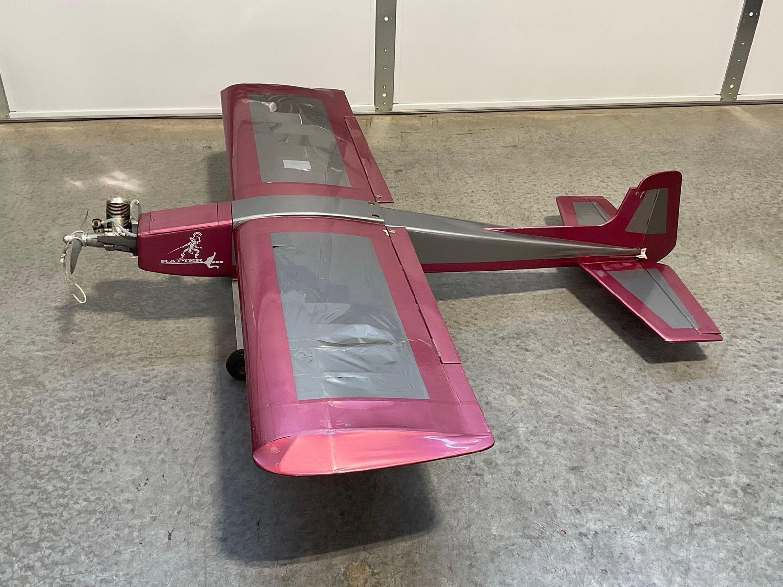 Rapier Purple & Grey Balsa RC Airplane w/RC Motor, MVVS .61 Glow Engine? 15x56x26 inches: The plane models included engines that were working 1+ years ago. All from the same collection. Appears to be in good shape. The piece measures approx 15h x 56w x 26d inches. See pics.