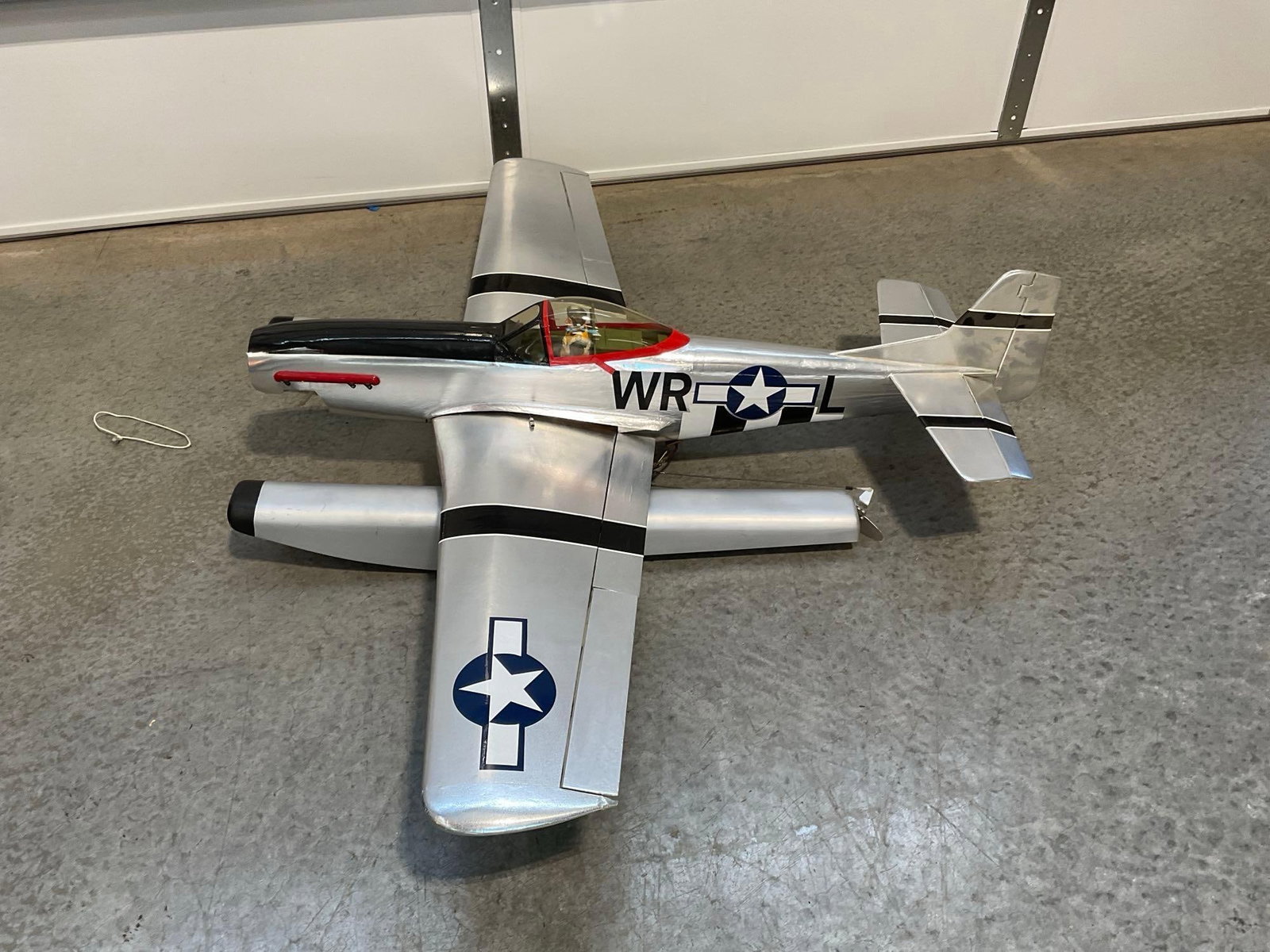 P-51D Mustang RC Airplane w/seaplane add-on, 5 foot wingspan, no engine included: The plane models included engines that were working 1+ years ago. All from the same collection. Appears to be in good shape. The piece measures approx 18h x 62w x 24d inches. See pics.