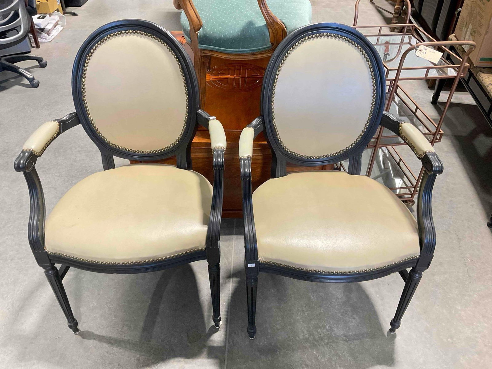 Pair of Antique Style Black Painted Wood Accent Chairs w/ Beige Vinyl Upholstery. See pics.: Pair of Antique Style Black Painted Wood Accent Chairs w/ Beige Vinyl Upholstery. Minor wear indicative of age and use, otherwise looks to be in fair condition. Measures 23" x 23" x 37" DM-6290 *