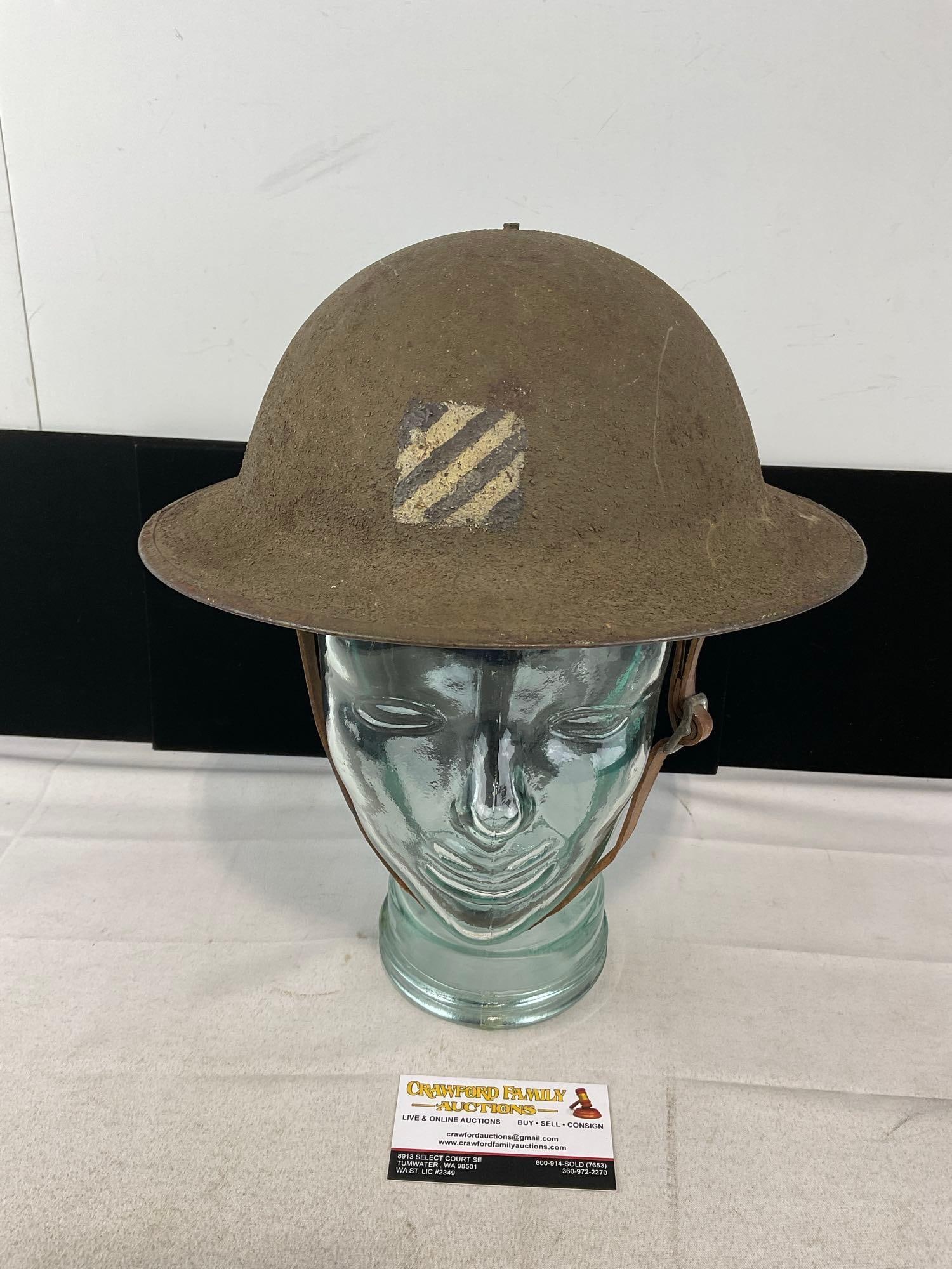 US WWI era M1917 Doughboy Steel Helmet, Insignia of 3rd Infantry Division, Rock of the Marne: Appears to be in good shape, some signs of wear & age. The piece measures approx 6h x 13w x 12d inches. See pics. E-6400