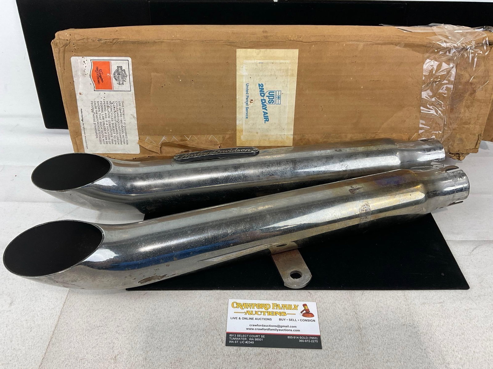 Vintage Harley Davidson Turnout Muffler Kit, Used, looks to be in original box, model 91735-85: Similar to the next piece. Appears to be in fair to good shape, looks to be used, and some wear can be seen, some wear on the box as well.. The pieces in the box measures approx 4h x 22w x 7d inches.