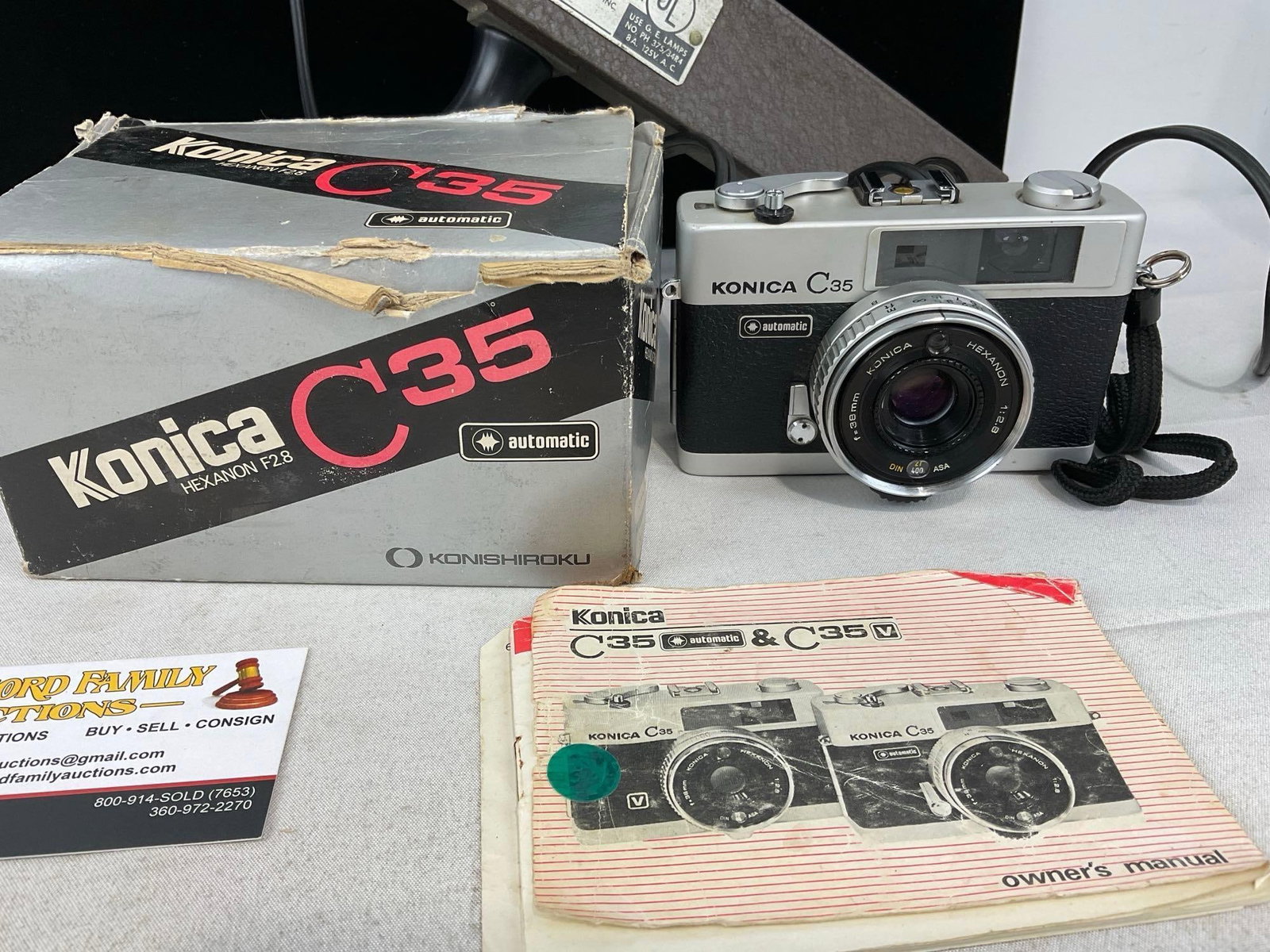 Revere Eight Model 88 Film Camera, w/case, Konica C35 Camera, & Powelite Jr. Model 20 Flash Module - 5
