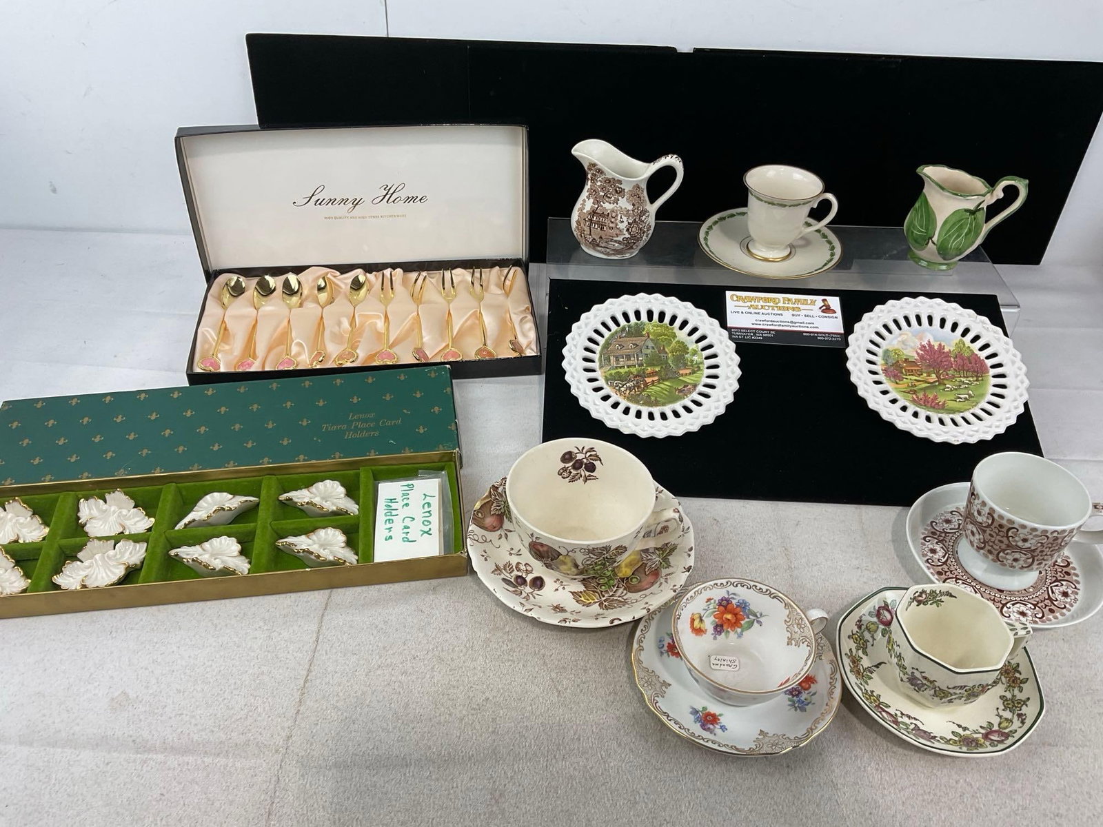 8 Lenox Place Card Holders, 5 cups, 7 saucers, 2 small creamers, Sunny Home Flatware Set: Cups & Saucers by Franciscan, Johnson Bros, Royal Doulton, Bavarian Schumann, Arabia, & more. Appears to be in good shape. The piece measures approx 7h x 15w x 12d inches. See pics. E-6480