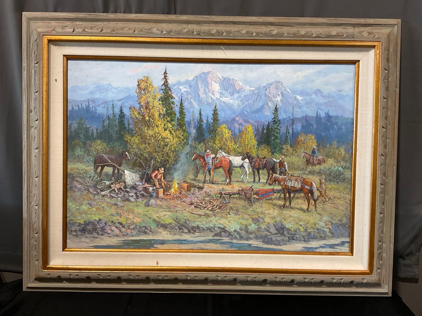 Framed Impasto Oil Painting Frontier Cowboys Making Camp near the River, 36x48 inches: Looks like it is signed in the lower left corner, marked 2003, possibly Fred Dielfield or something similar. Appears to be in good shape. The piece measures approx 36h x 48w x 4d inches. See