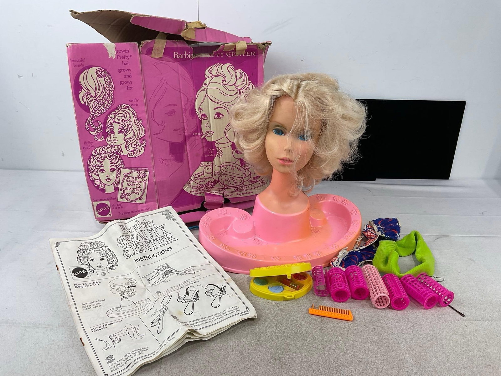 Vintage 1970s Barbie Beauty Center w/original box, w/some accessories: Appears to be in fair shape, shows wear on the box. The piece measures approx 14h x 16w x 9d inches. See pics. E-6300