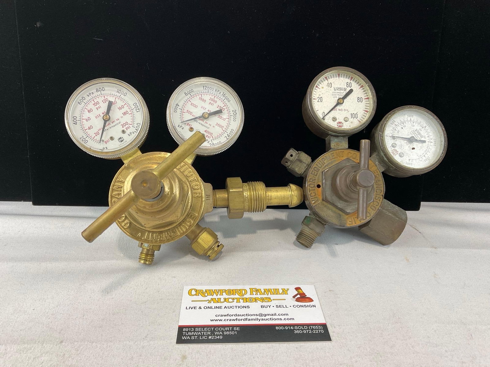Pair of Cast Brass Victor Equipment Co. Valves, w/Oxygen/Acetylene US Gauge Co. Gas Gauges: Appears to be in good shape. The piece measures approx 7h x 10w x 7d inches. See pics. E-6300