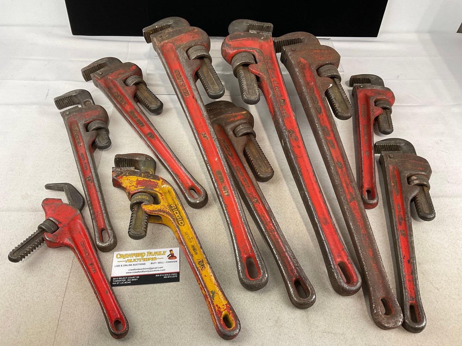 10 Craftsman & Ridgid Cast Iron Pipe Wrenches, 24, 18, 14 inches, & smaller: *No in-house shipping, due to weight* Each piece is roughly 6-10 pounds, quite heavy all together. Appears to be in fair to good shape, some finish wear on all of the pieces. The piece measures